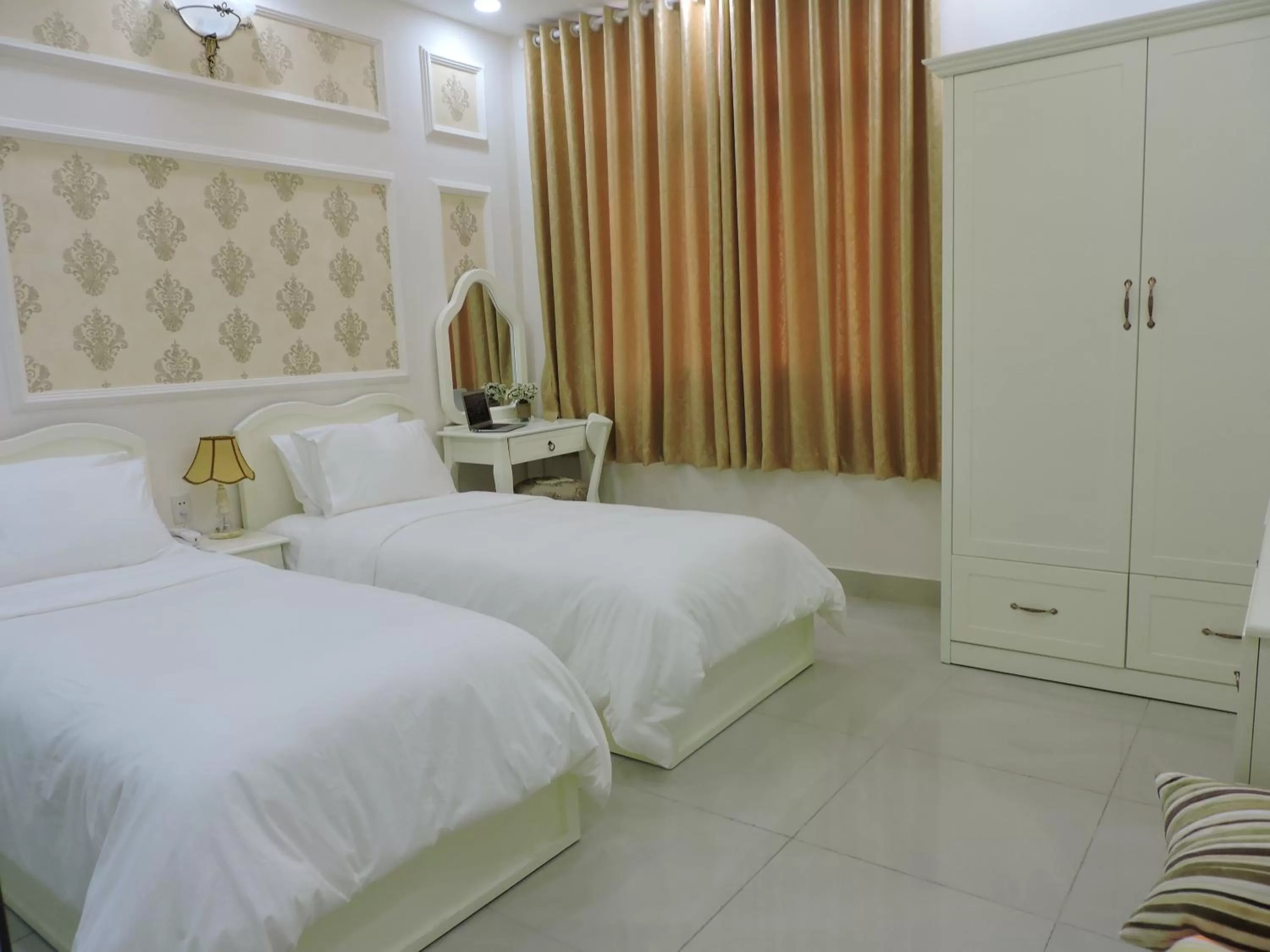 Bed in Chez Lotus Rose