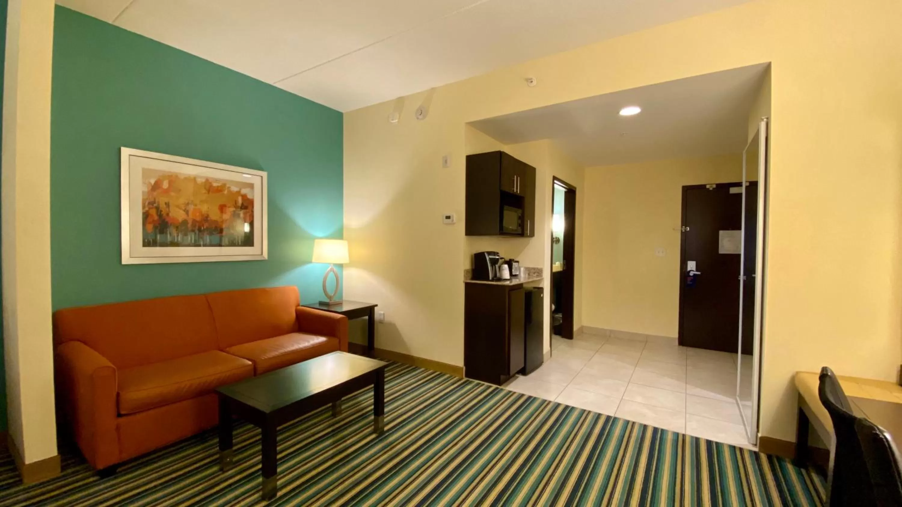 Photo of the whole room, Bed in Holiday Inn Express Hotel & Suites Orlando East-UCF Area by IHG