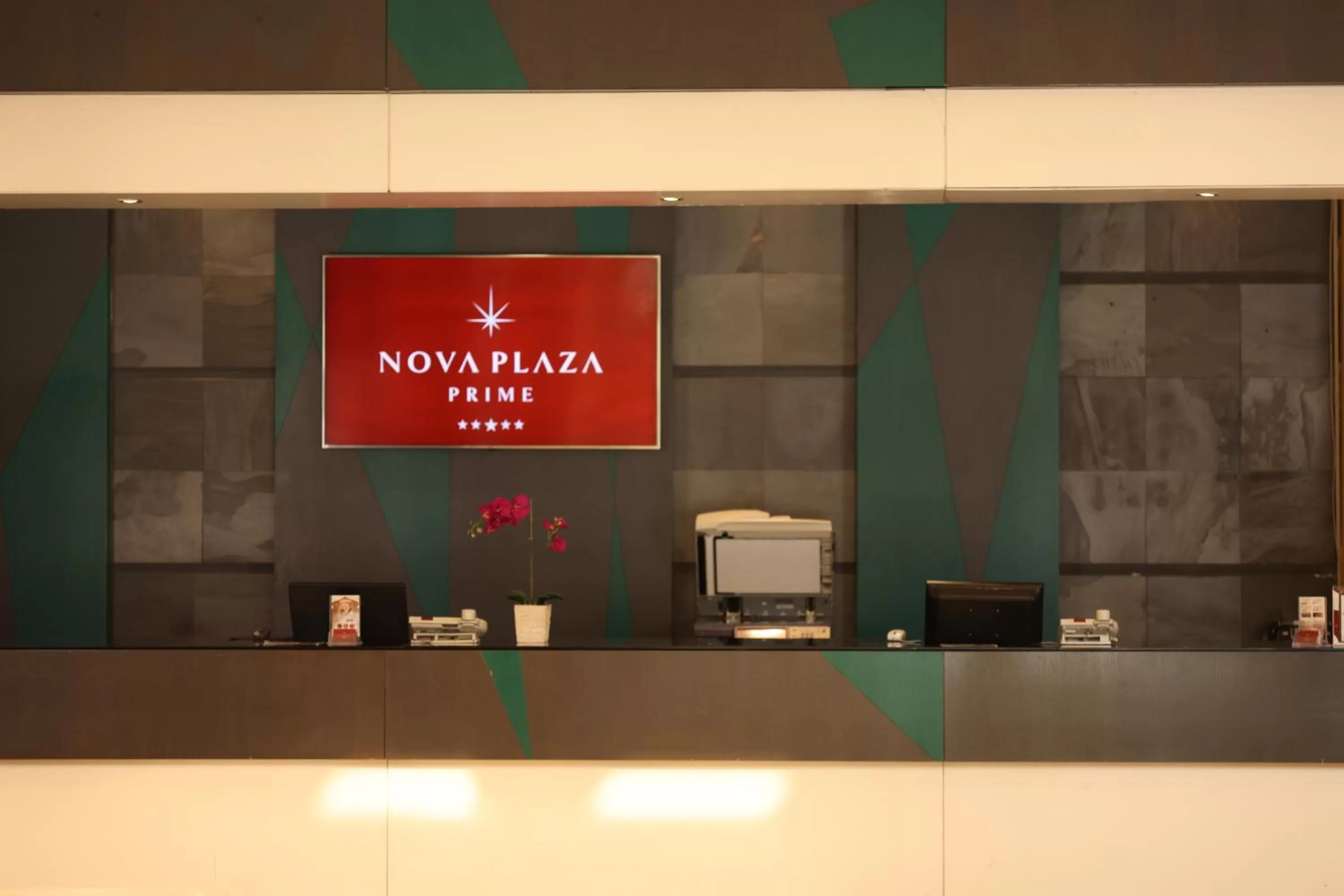 Property logo or sign in Nova Plaza Prime Hotel
