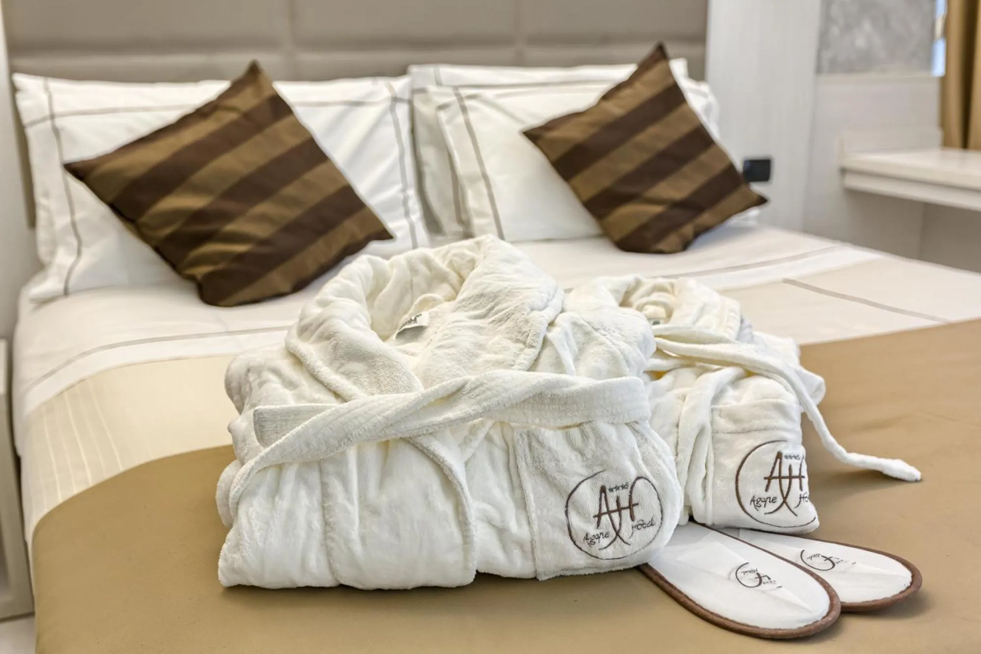 Bed in Agape Hotel - AA Hotels