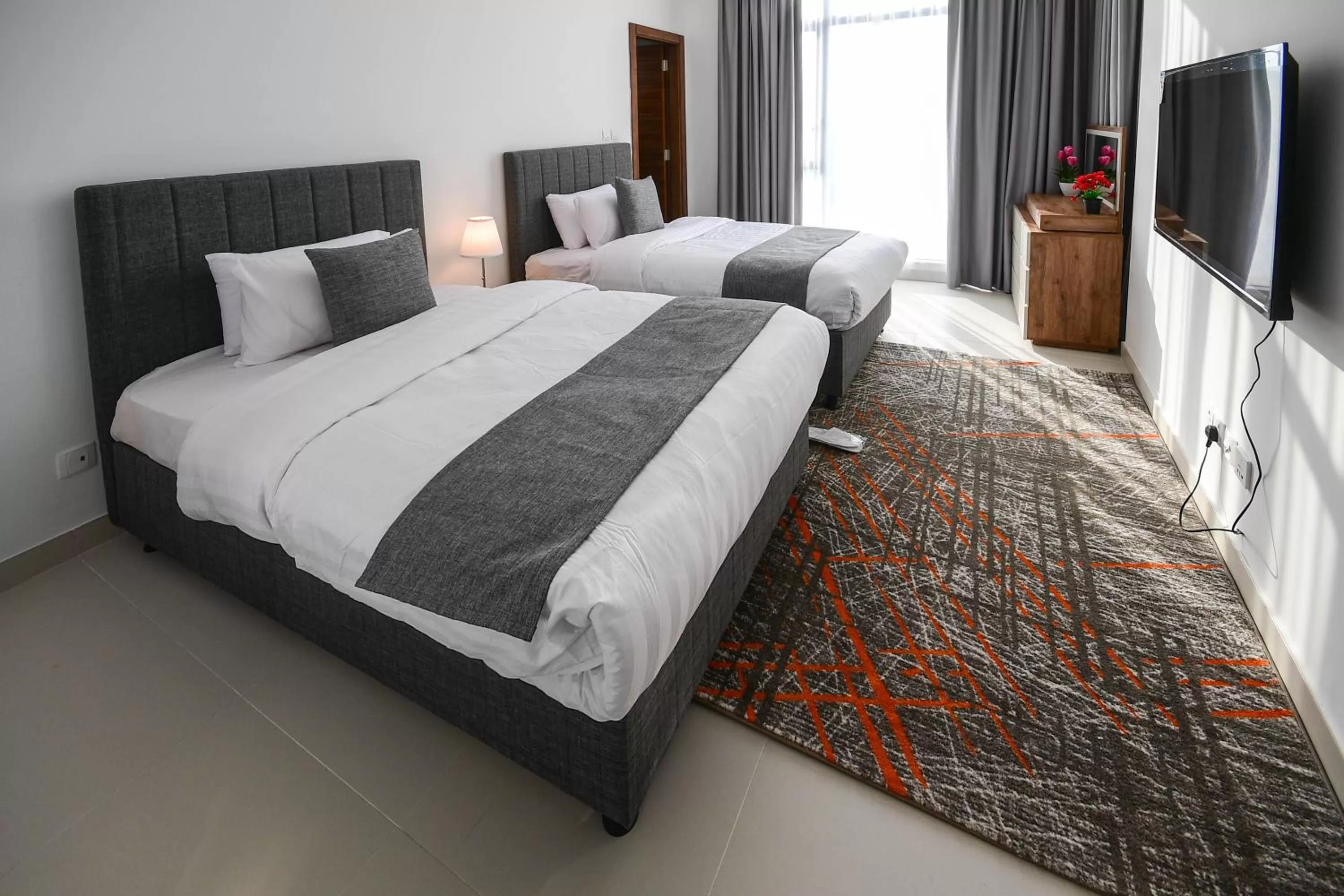 Bed in Noor Amwaj Hotel & Apartment