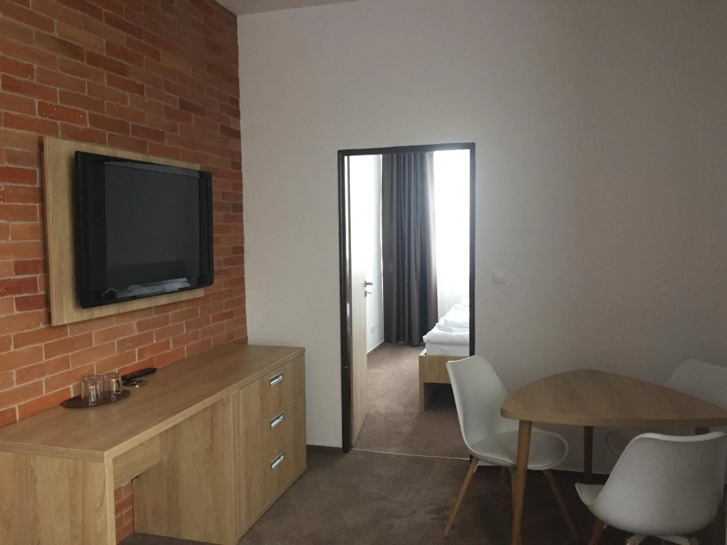 TV/Entertainment Center in Hotel Bothe