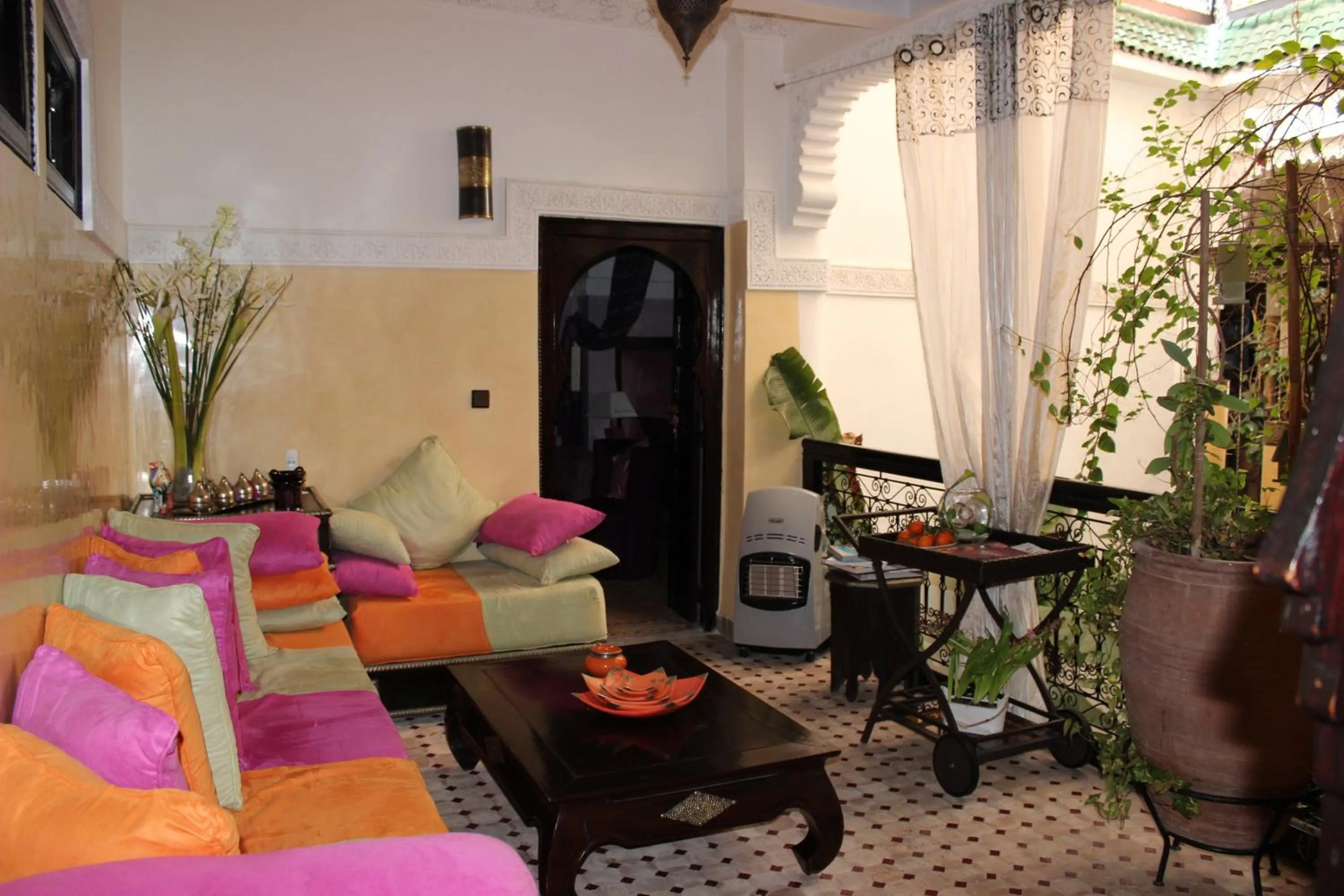 Living room, Bed in Riad Eloise