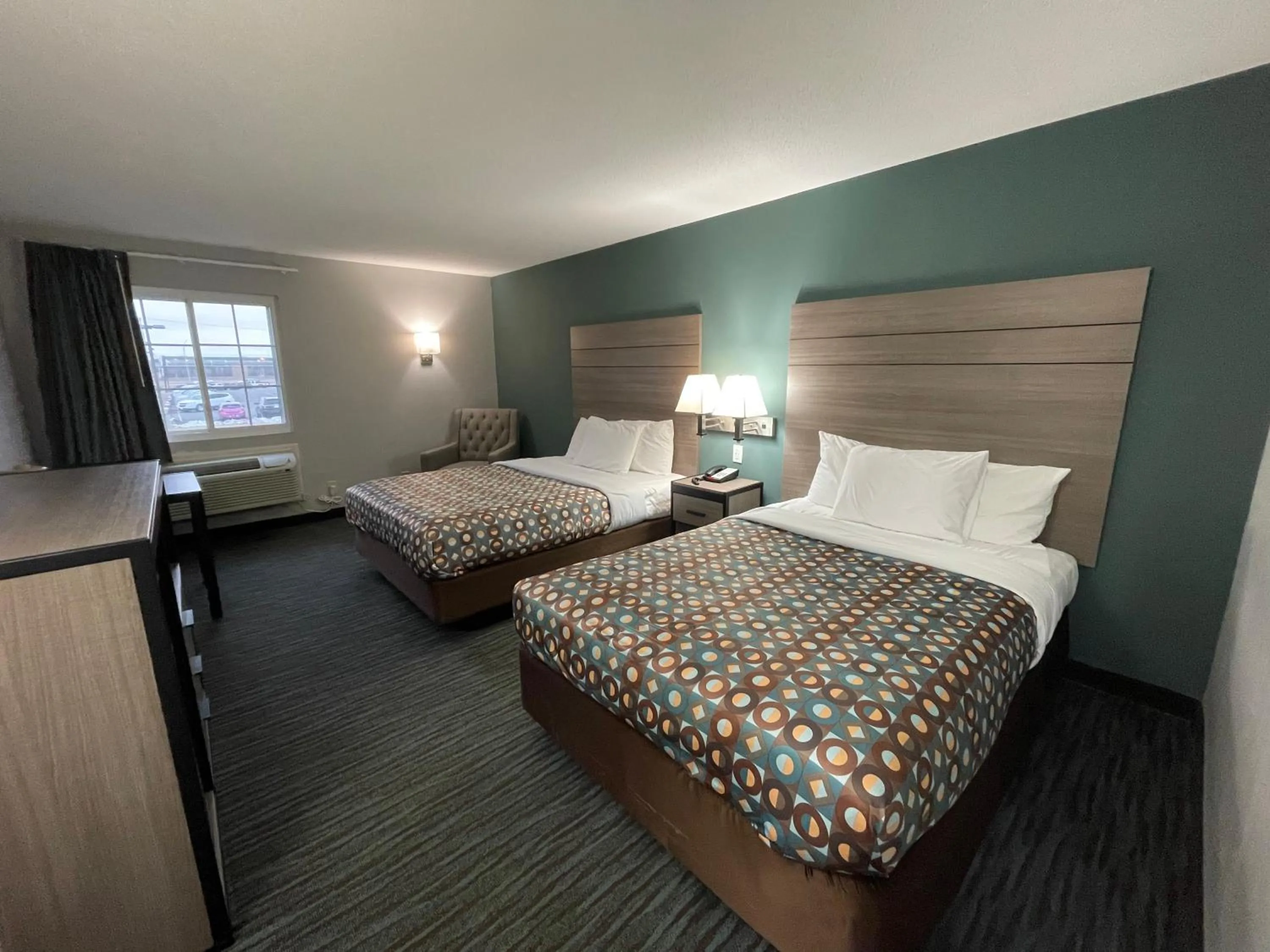 Photo of the whole room, Bed in Countryside Inn & Suites Omaha East-Council Bluffs IA
