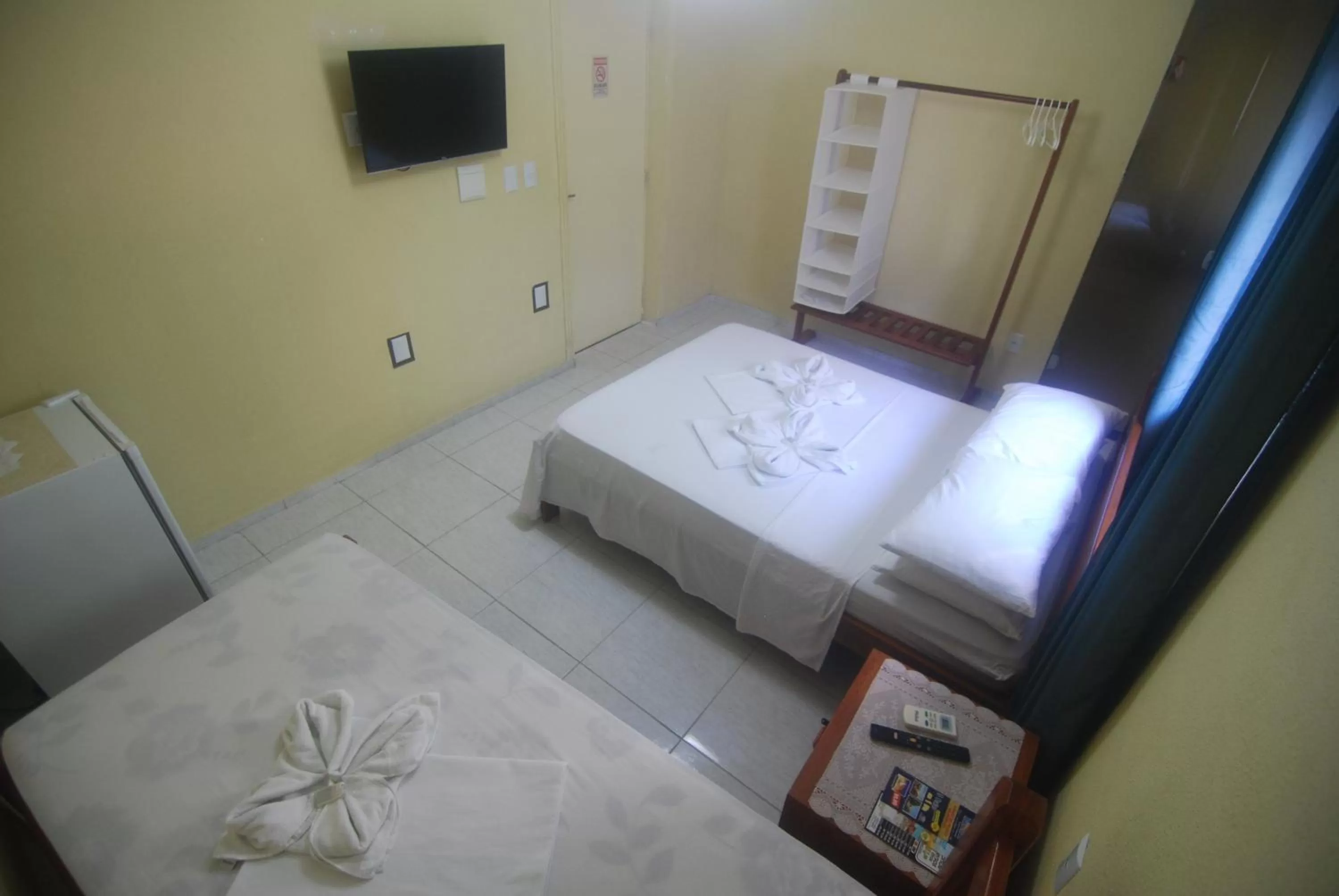 Bed in Refúgio Pousada Fortaleza