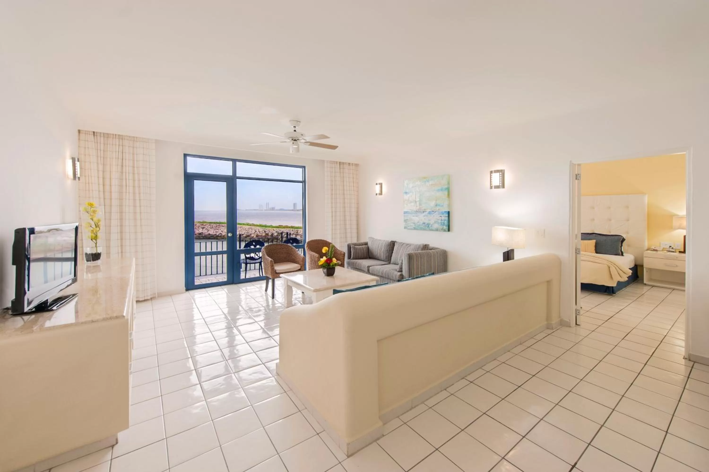 Seating area, Bed in El Cid Marina Beach Hotel