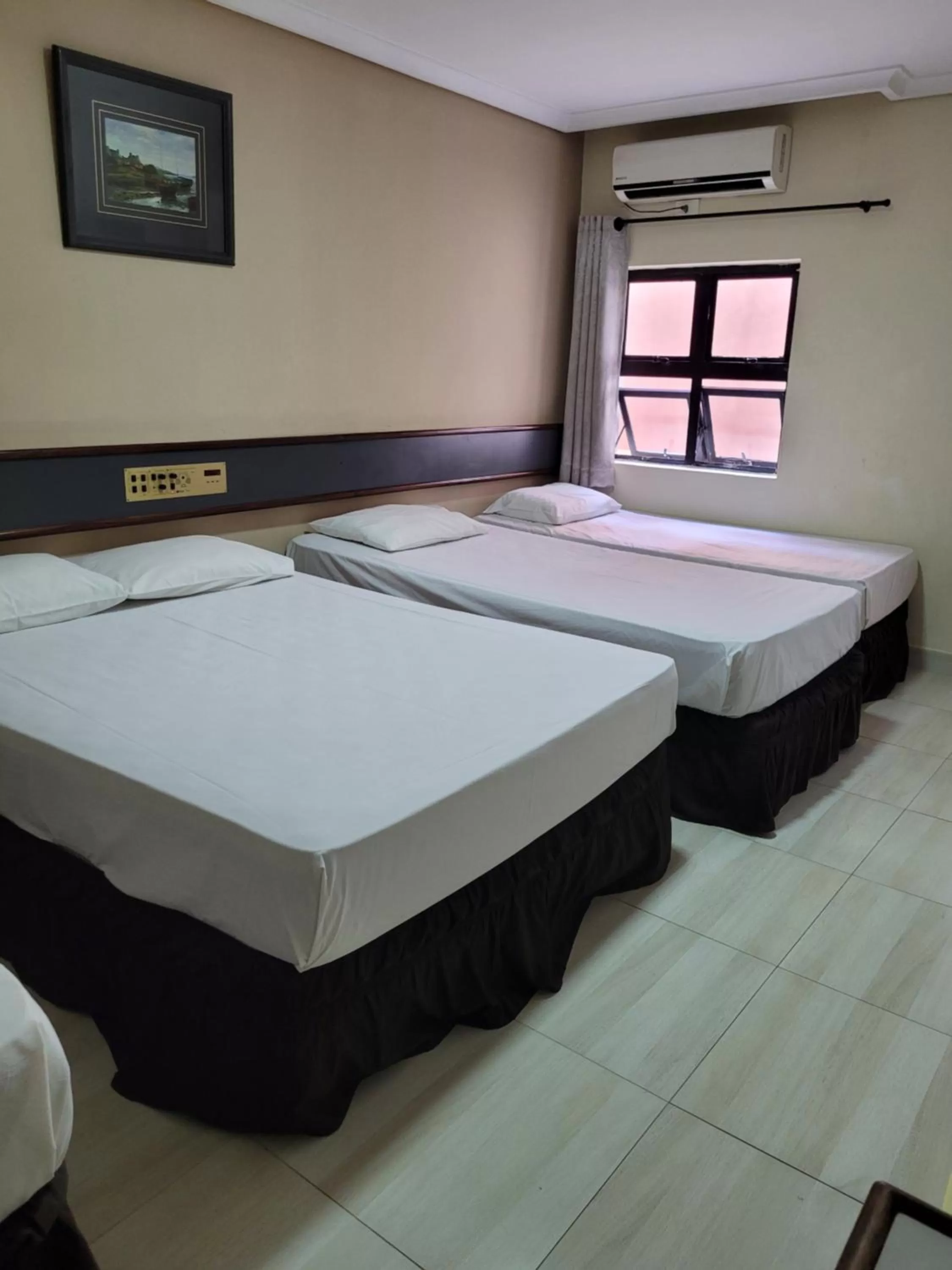 Bed in Hotel Estação Express