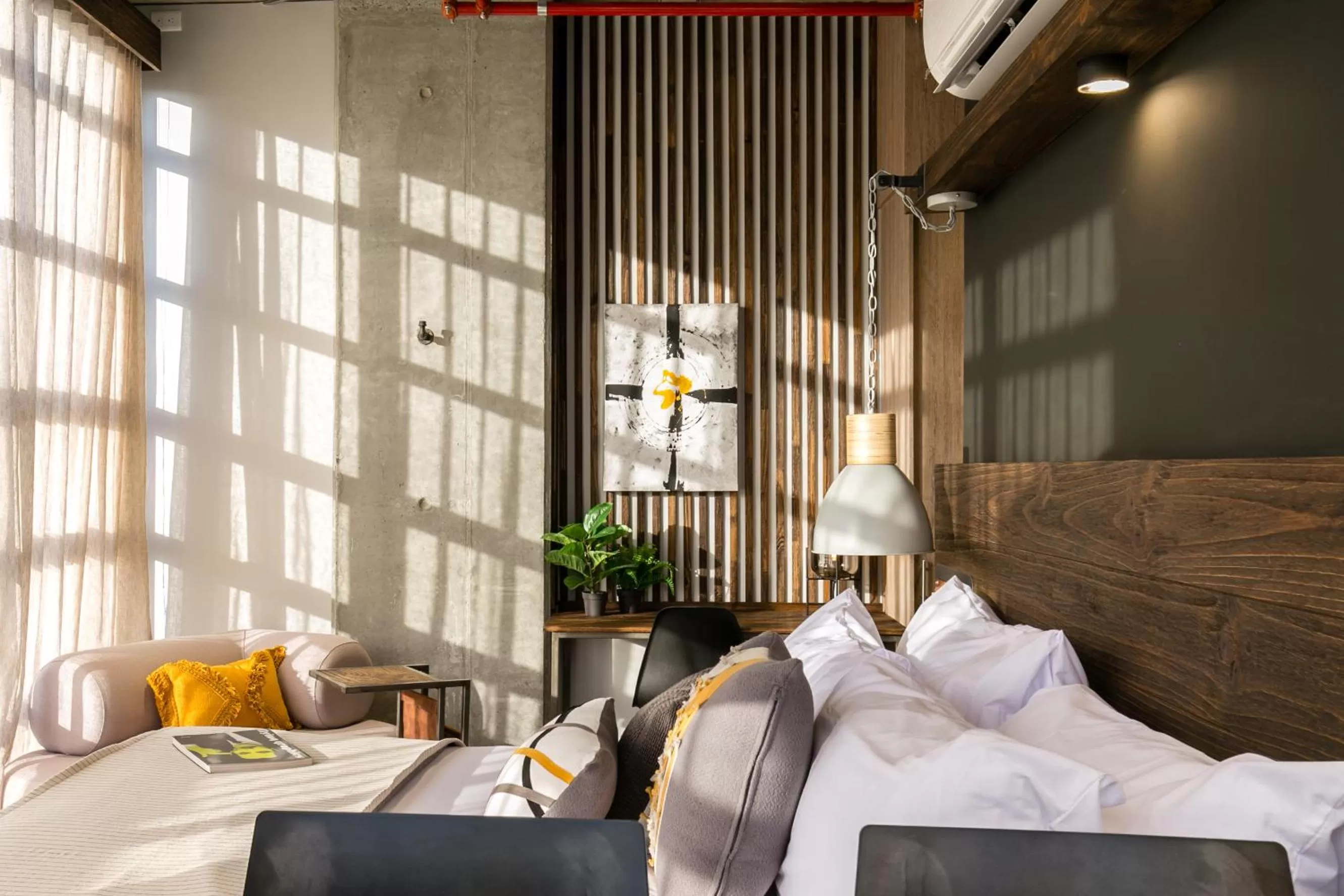 Bed in Factory Lofts Hotel