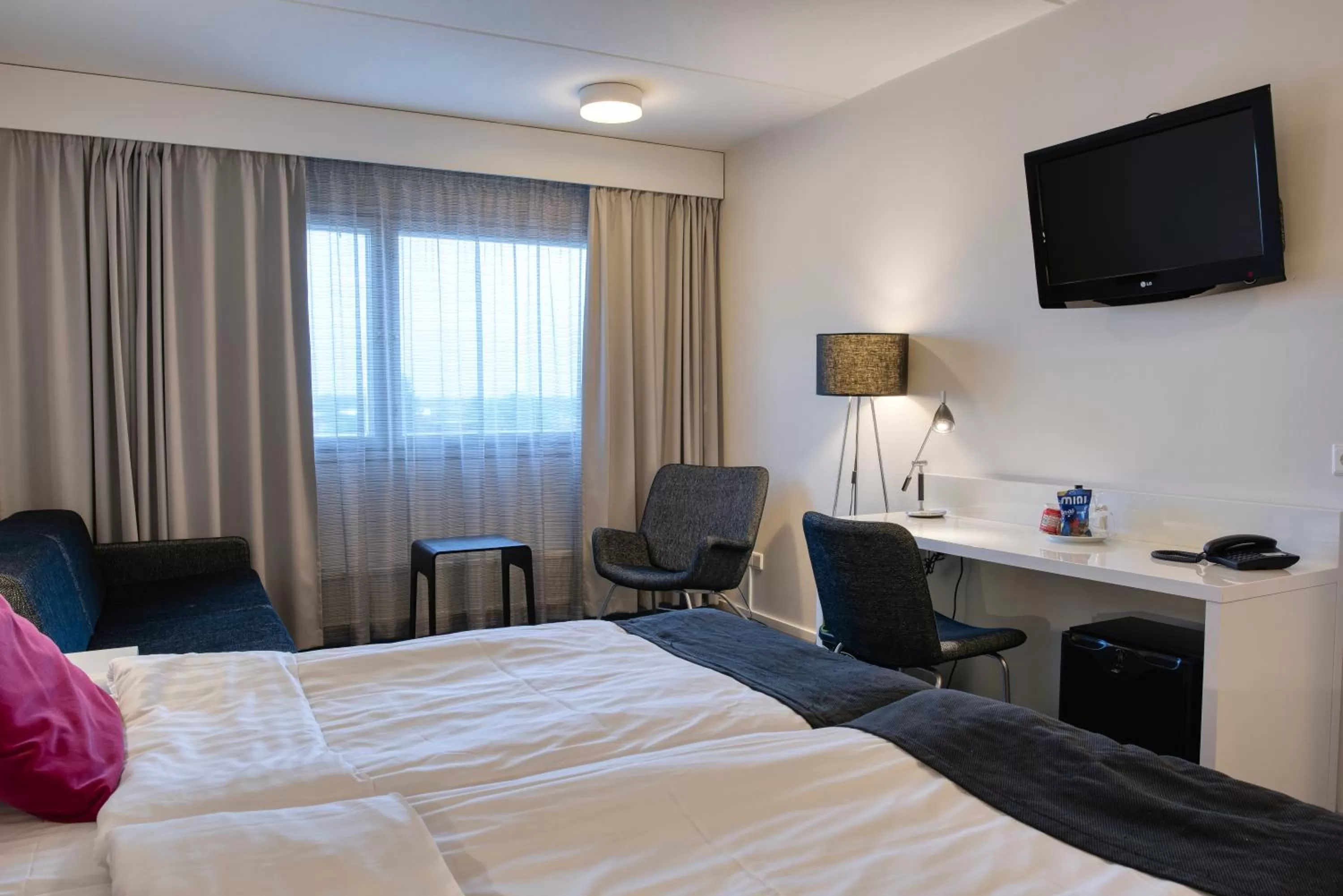 Photo of the whole room, Bed in Teatterihotelli Riihimäki