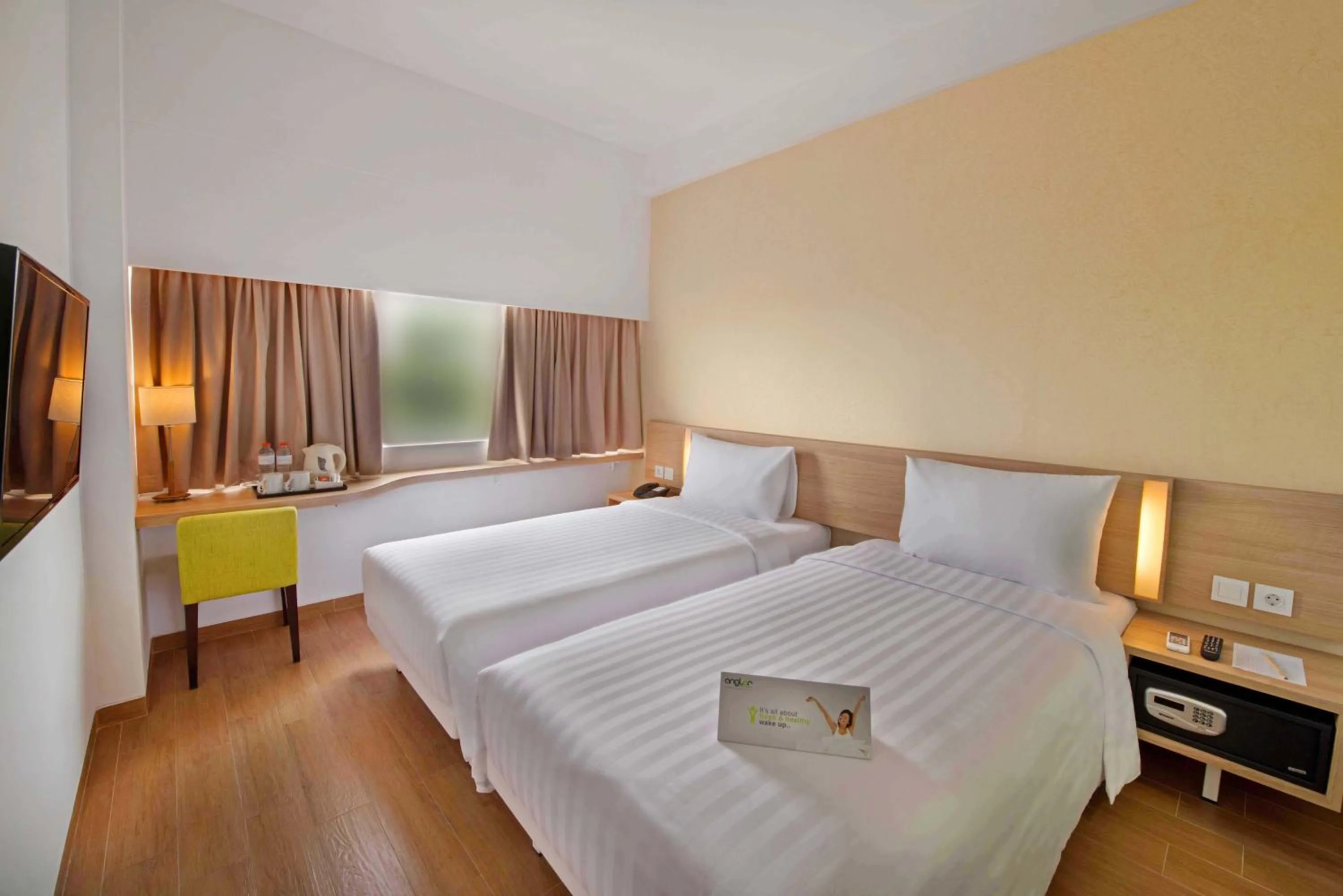 Bedroom, Bed in Whiz Prime Hotel Pajajaran Bogor