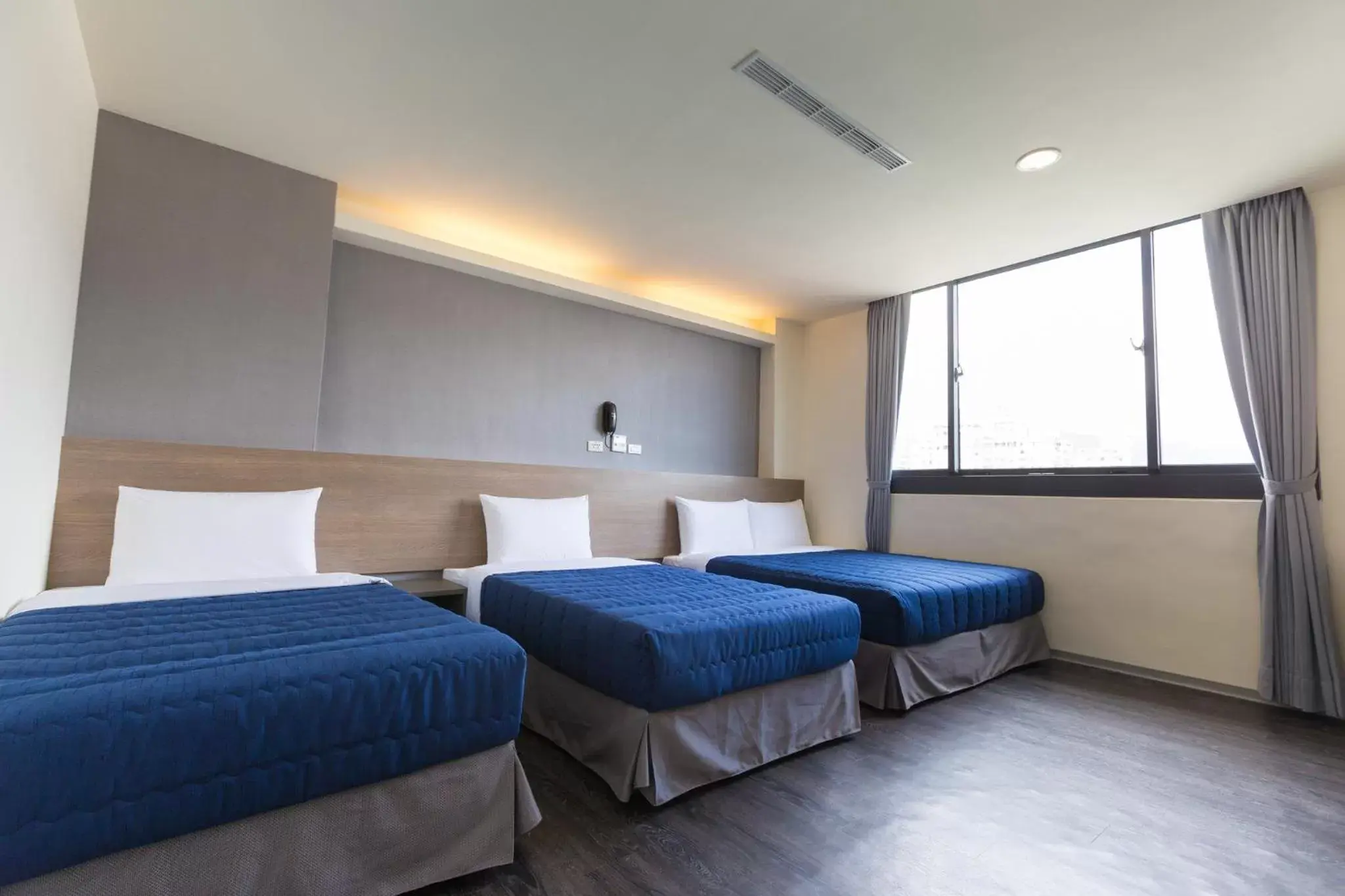 Quadruple Room in Bulowan Hotel Quadruple Room in Bulowan Hotel