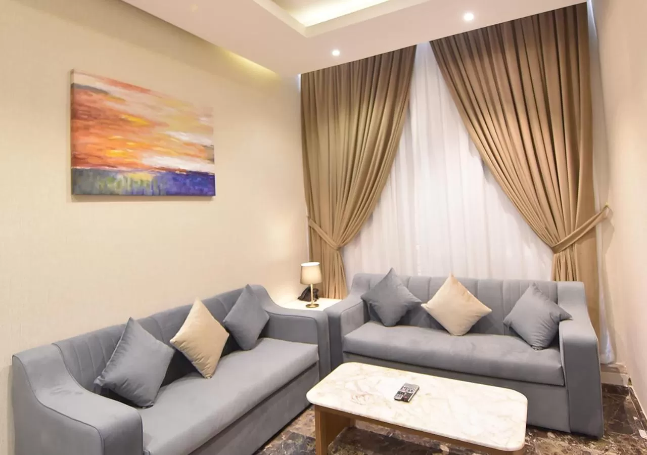 Communal lounge/ TV room, Seating Area in Rihanna Hotel Apartment