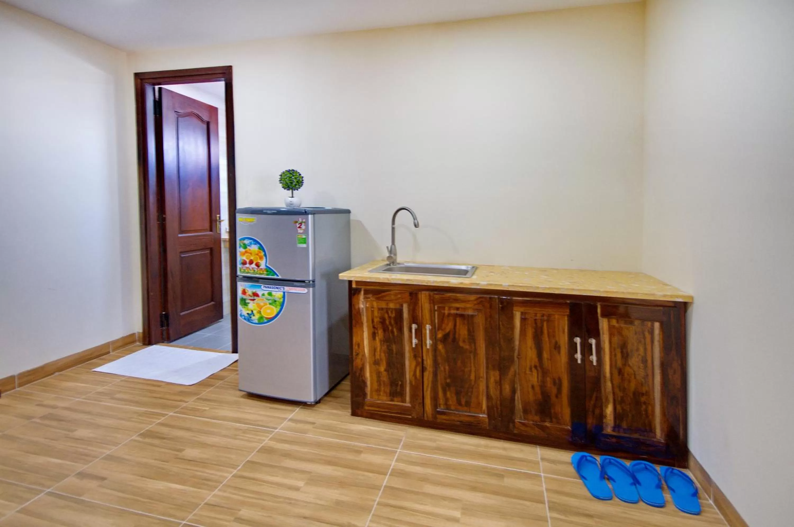 Kitchen or kitchenette in Harvey Hotel & Apartments
