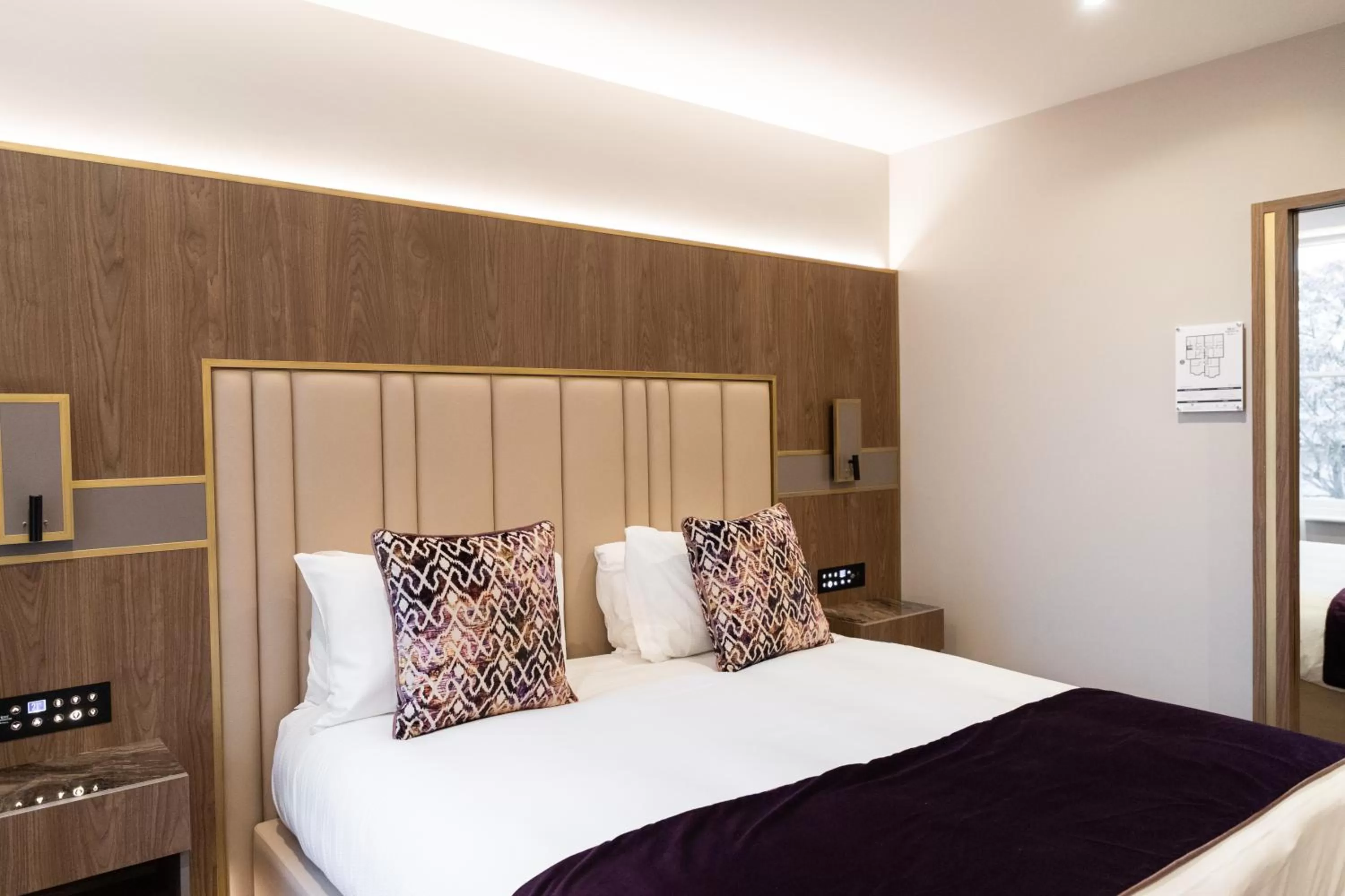 Bed in Merit Kensington Hotel