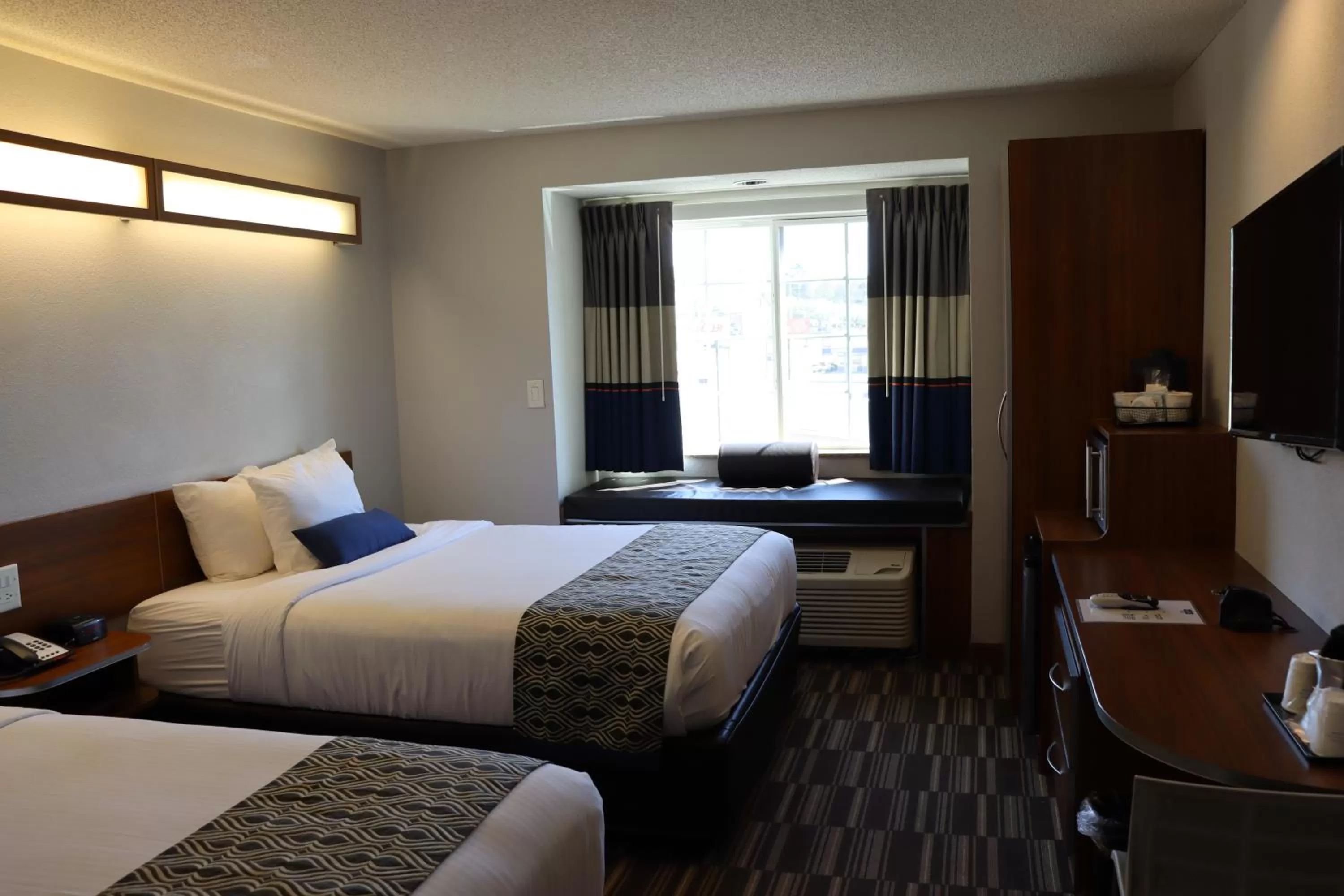 Bedroom, Bed in Microtel Inn & Suites by Wyndham Columbus Near Fort Moore