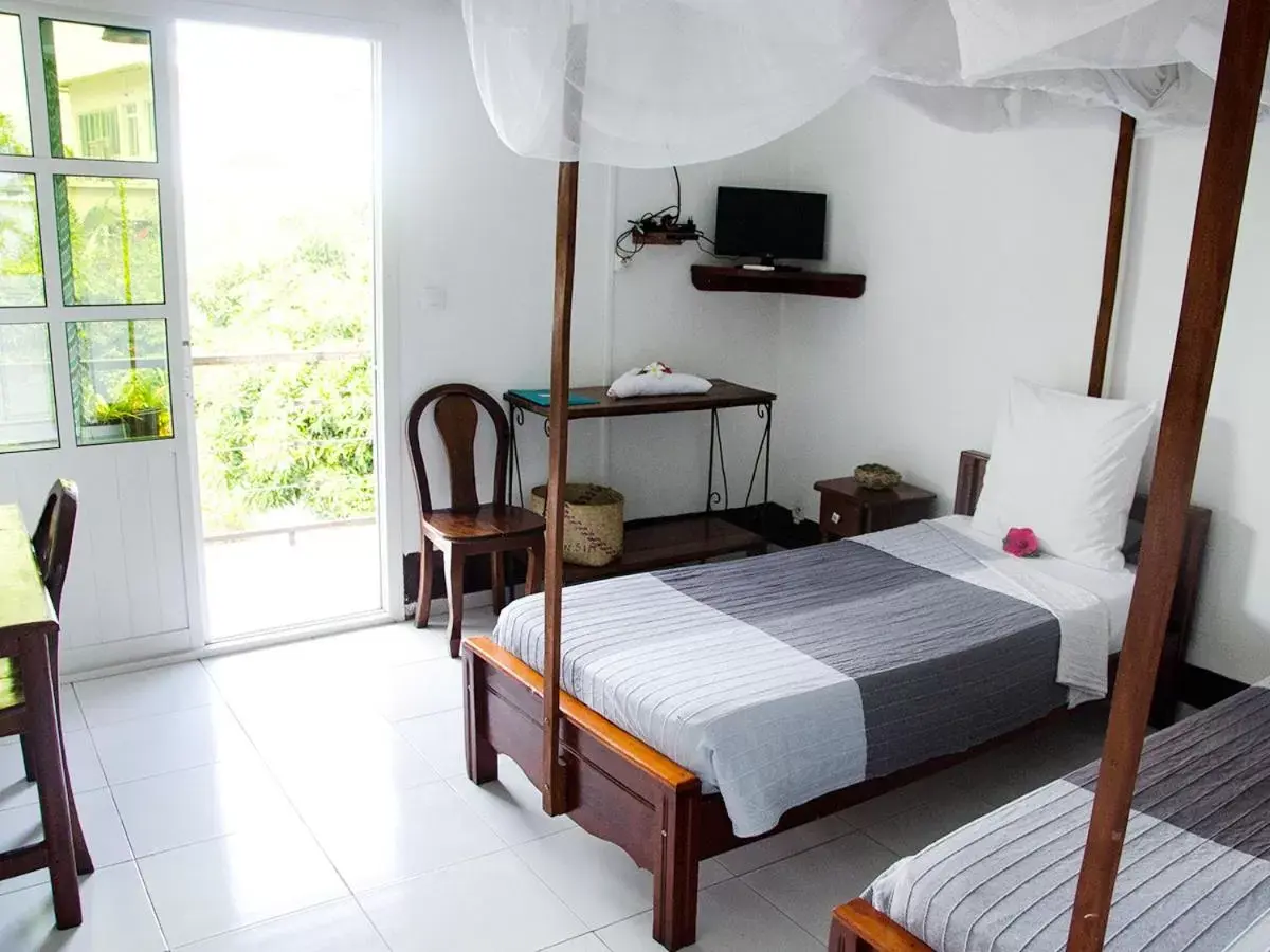 Twin Room with Garden View - single occupancy in Hotel Jardin de la Paix Twin Room with Garden View - single occupancy in Hotel Jardin de la Paix