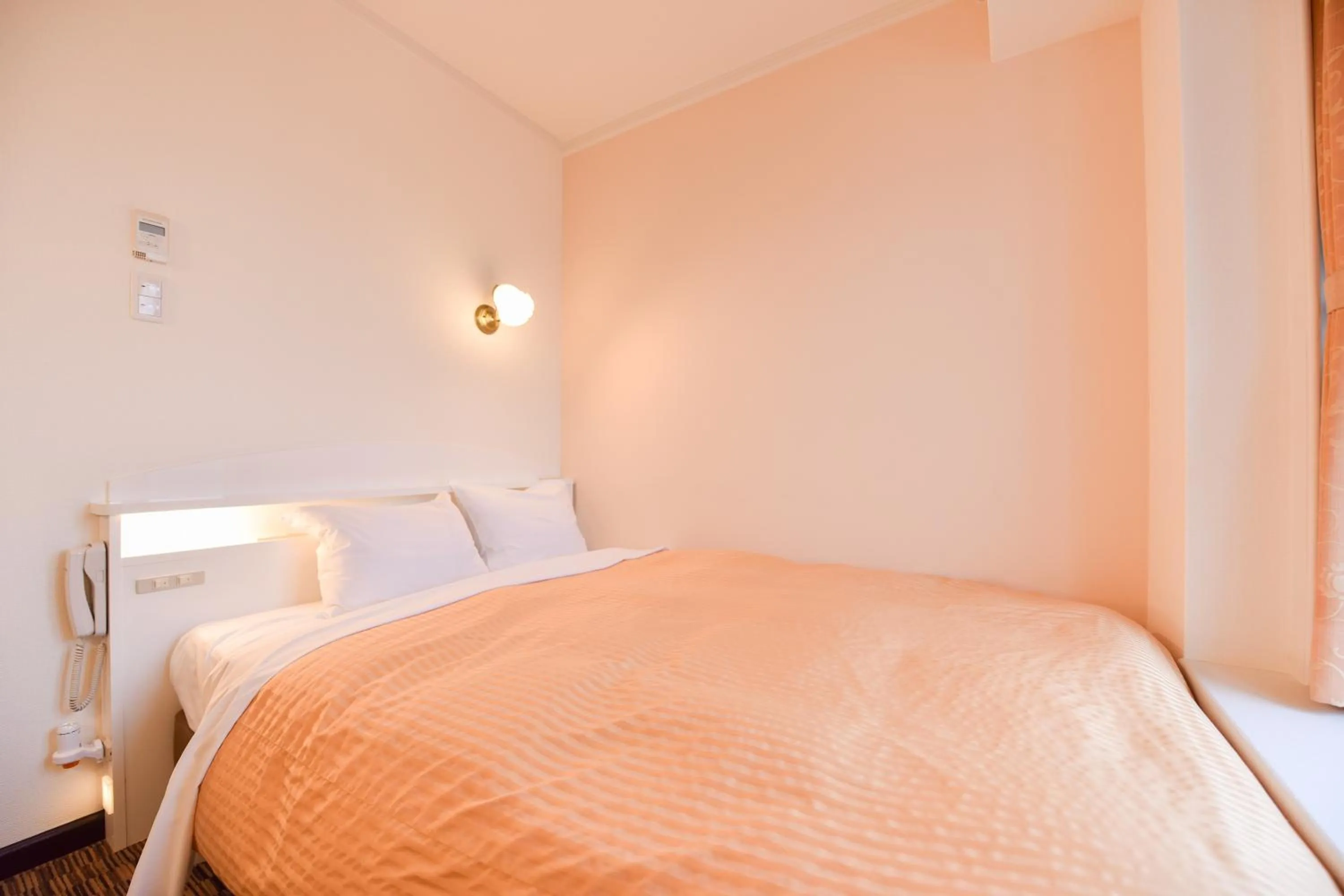 Bed in Kobe Sannomiya Union Hotel