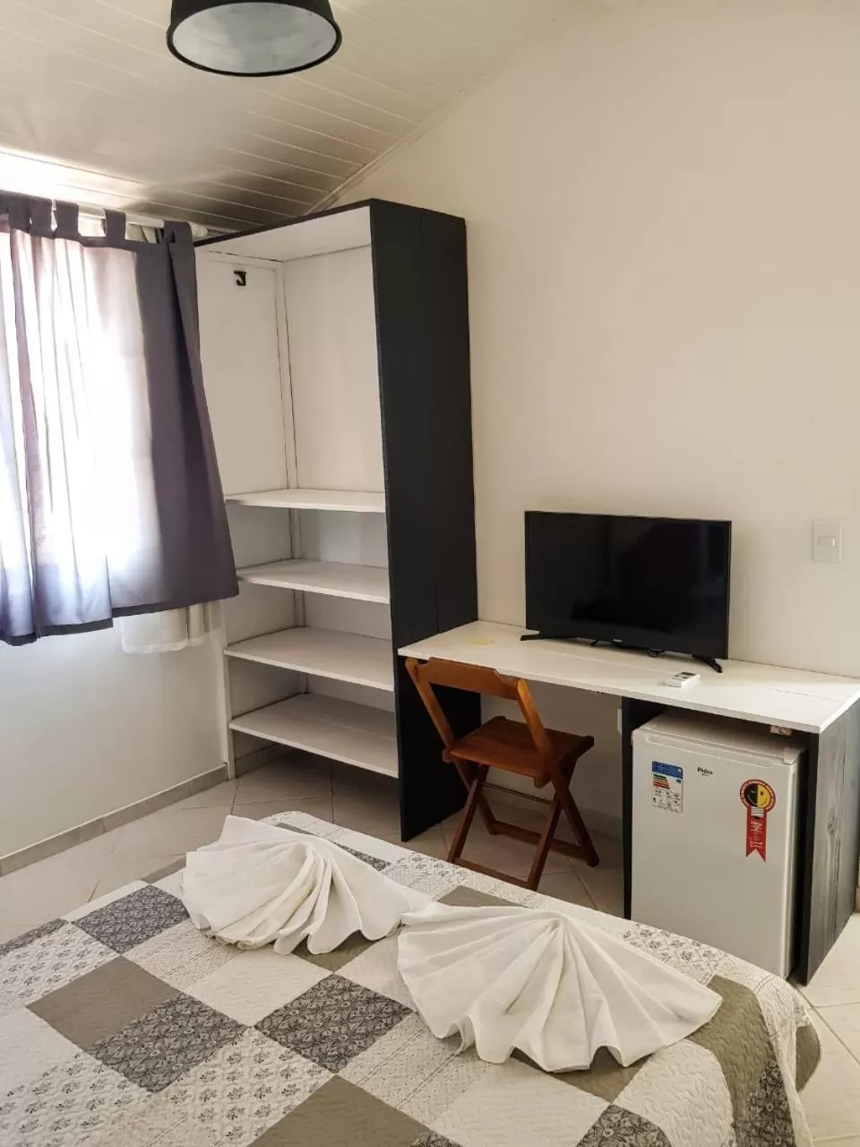 TV/Entertainment Center in Casa de Hóspedes "Guesthouse Prainha"