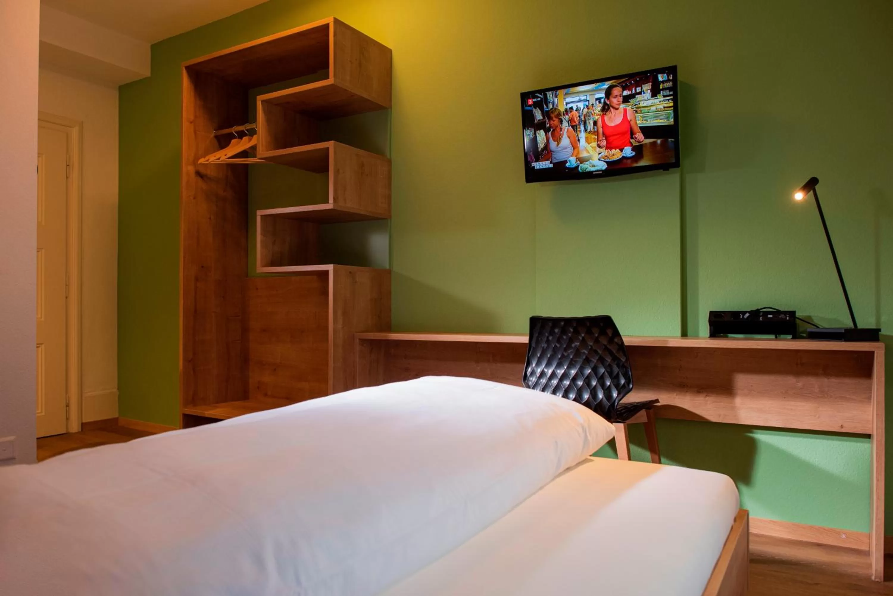 Bed in SEELANDHOTEL Weisses Kreuz