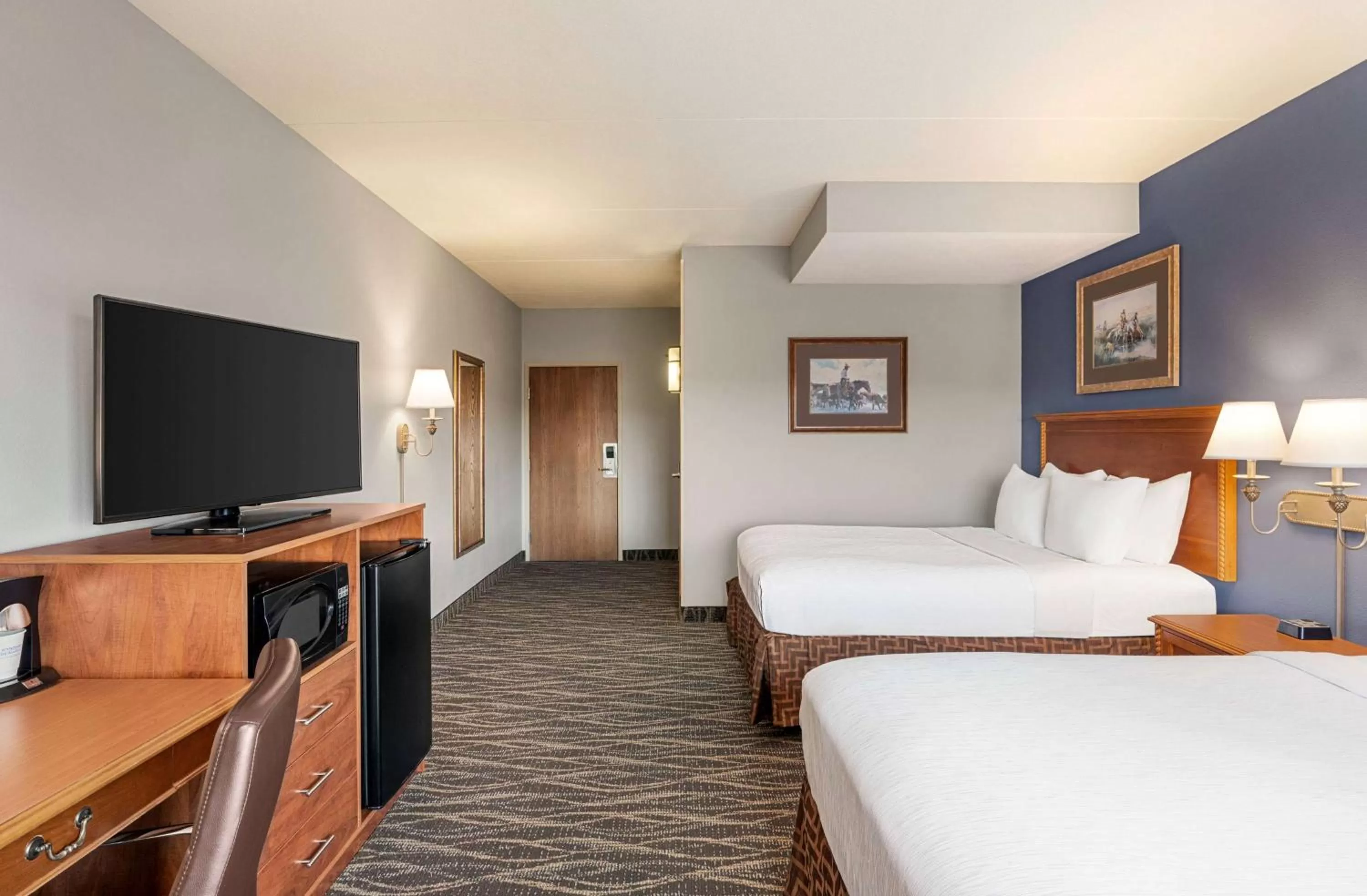Photo of the whole room, Bed in AmericInn by Wyndham Laramie Near University of Wyoming