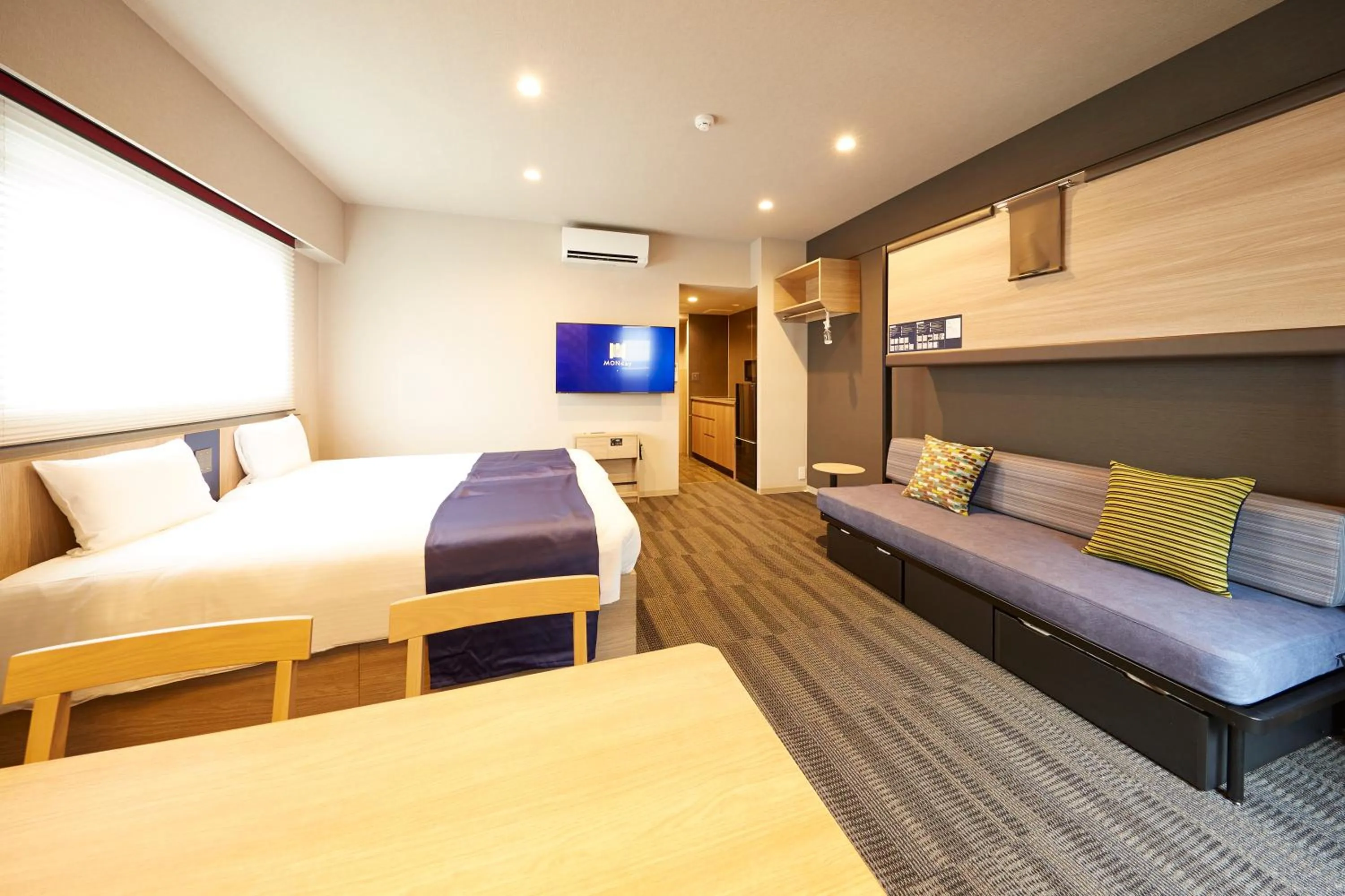 Bed in MONday Apart Hamamatsucho Daimon