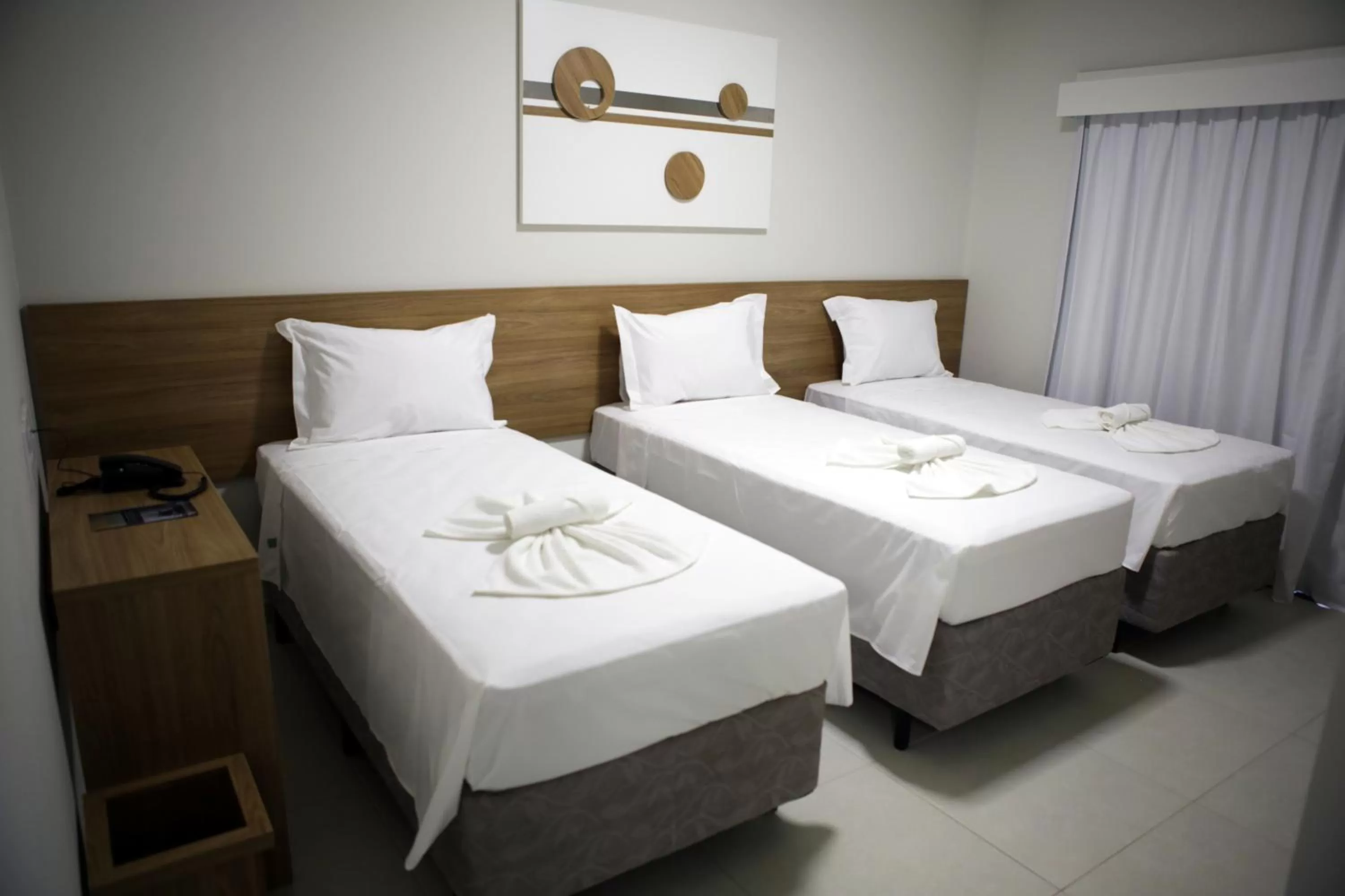 Bed in Regional Plaza Hotel Event Park