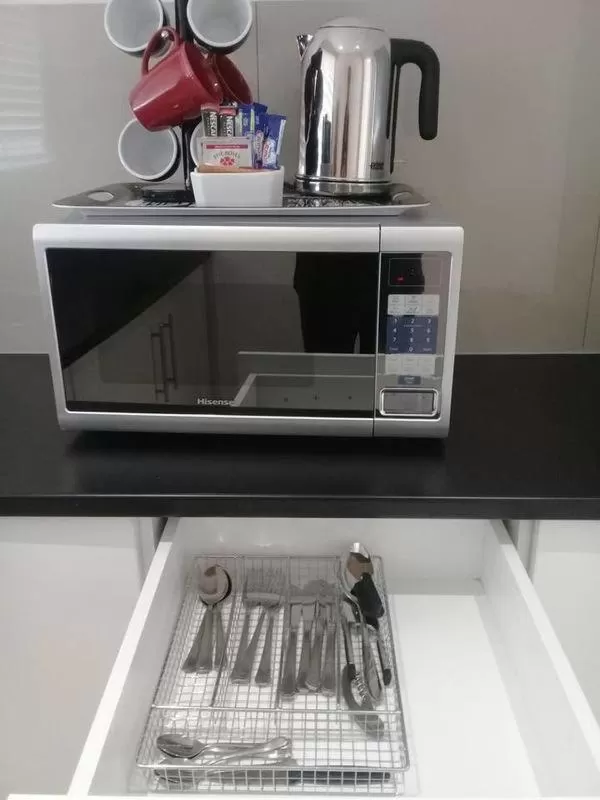 Kitchen or kitchenette in Apollo Hotel