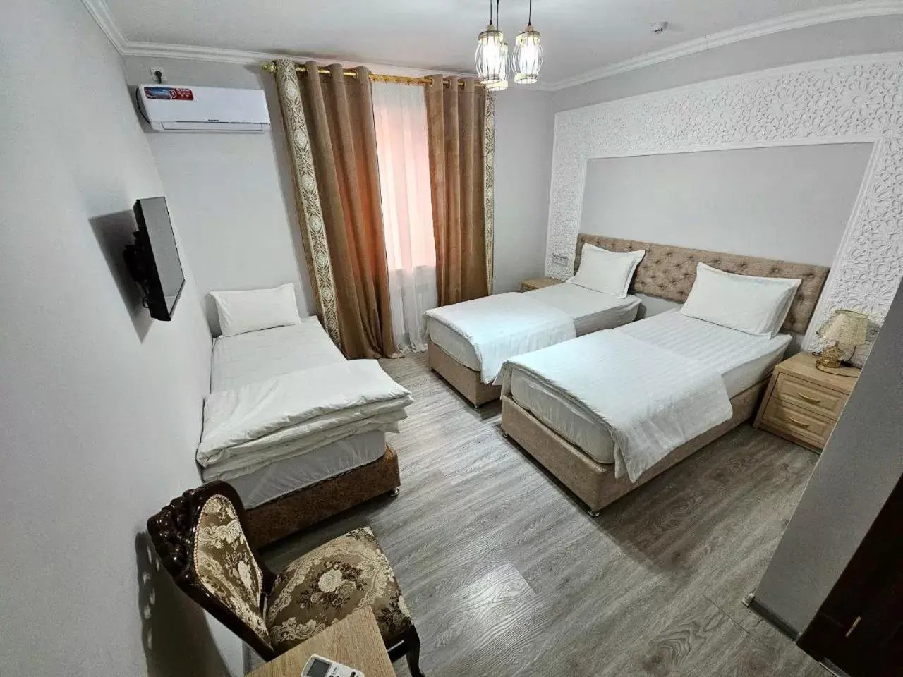 Triple Room with Private Bathroom in Khans Palace Hotel Triple Room with Private Bathroom in Khans Palace Hotel