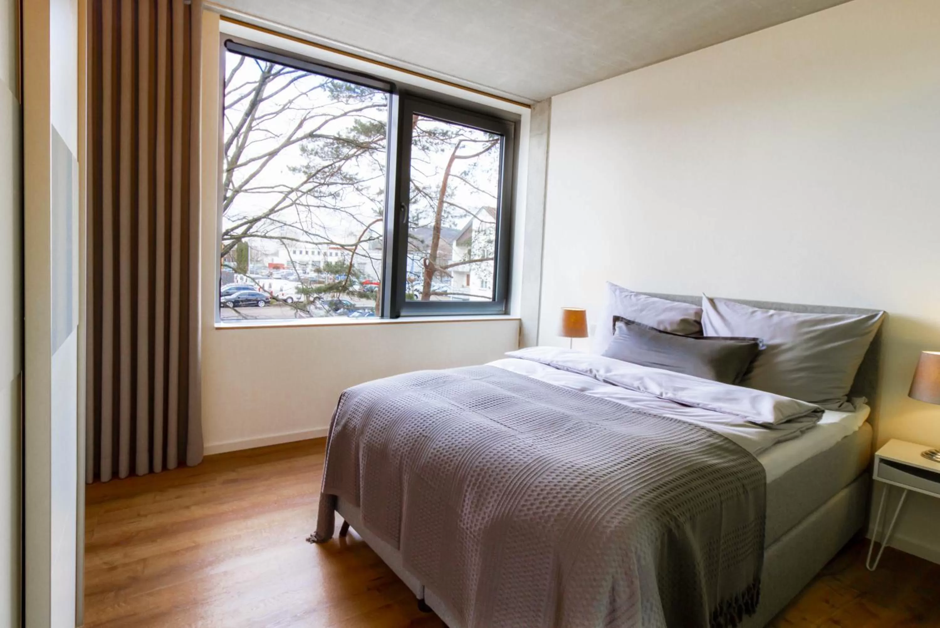 Bed in Gohlke L.O.F.T. Apartments