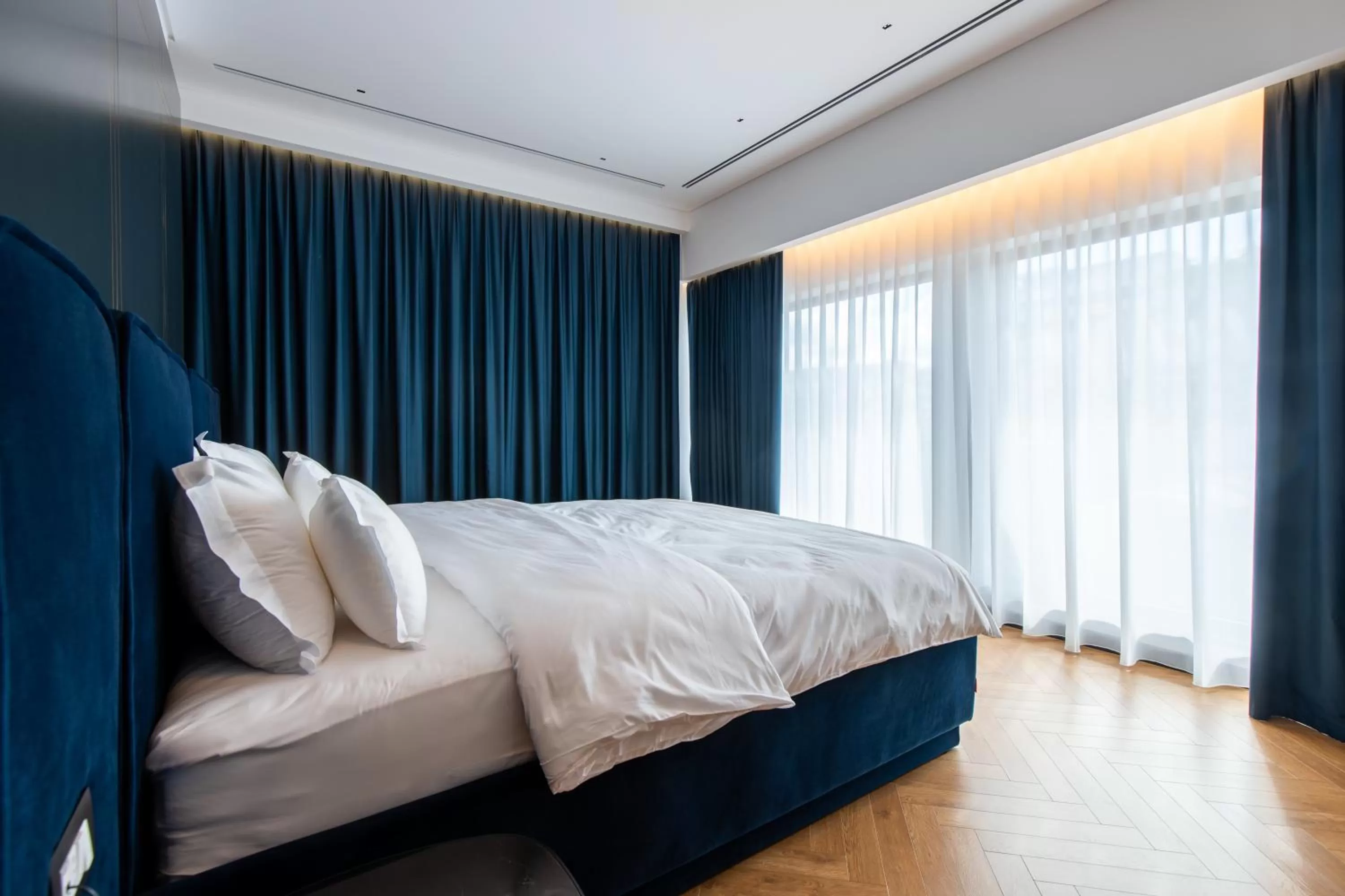 Bed in Moncafe BoutiqueHotel Spa