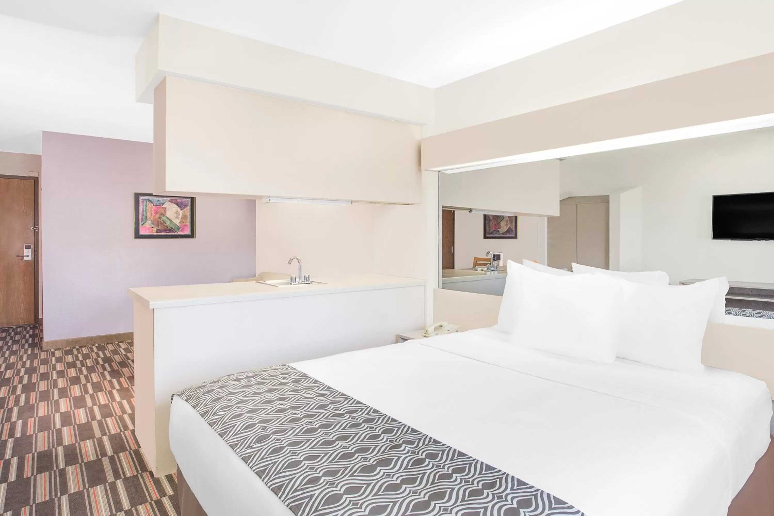 Bed in Microtel Inn and Suites by Wyndham Appleton