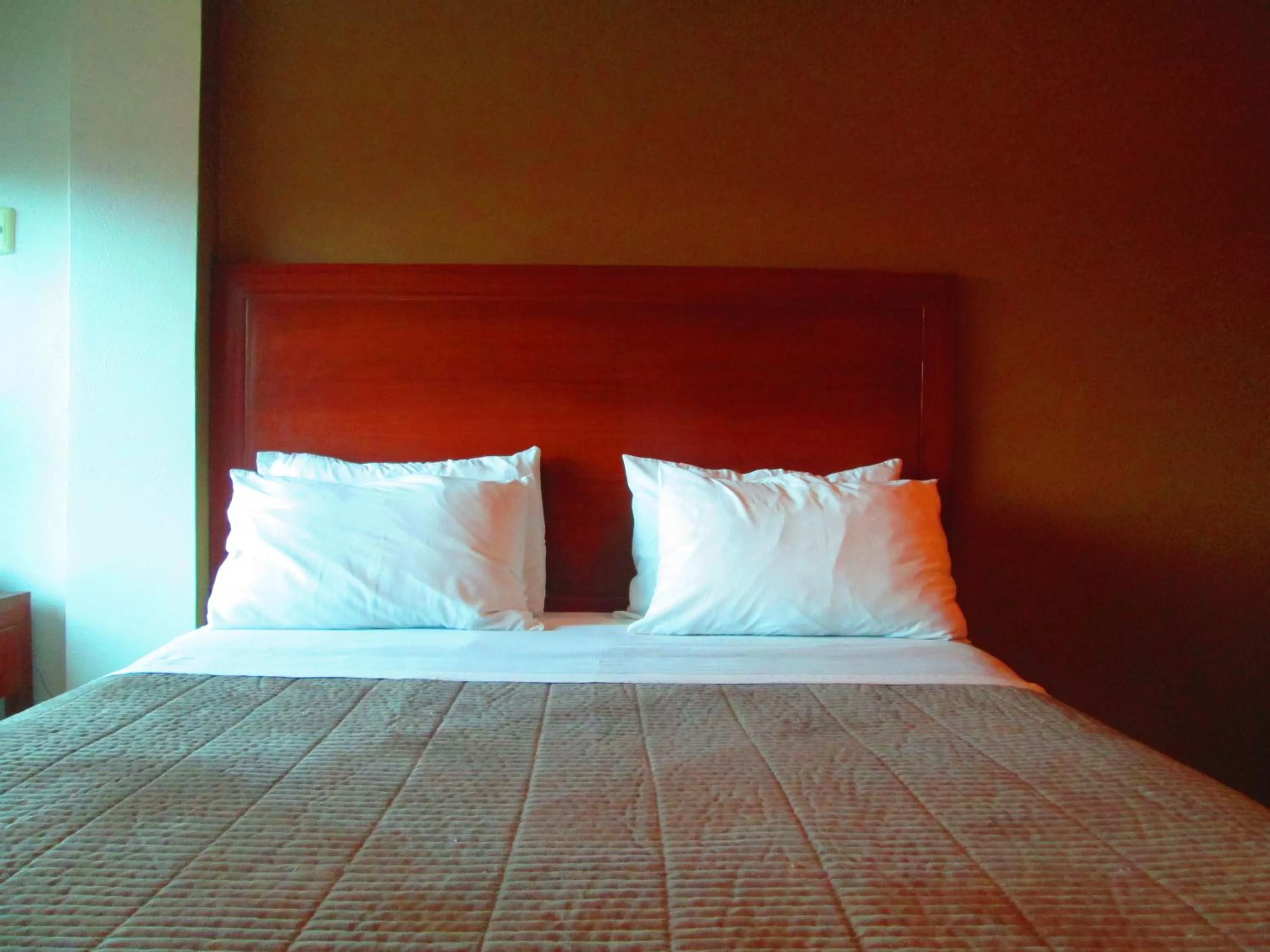 Bed in Hotel Garzota Inn