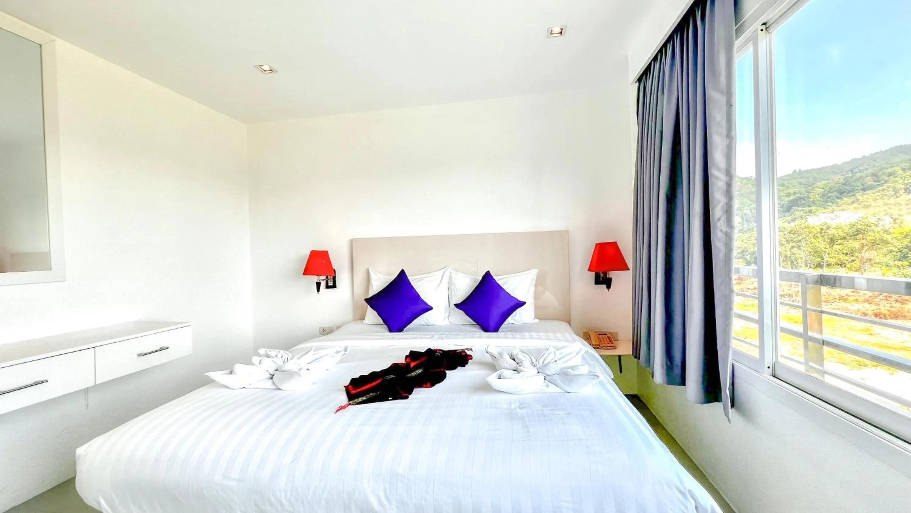 Bed in Grand Sunset Hotel Phuket