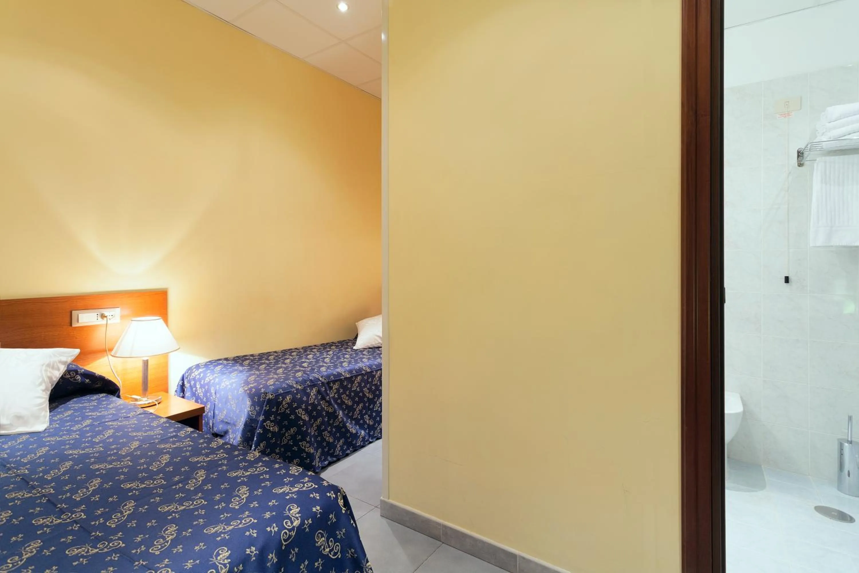 Bed in Hotel Oriente