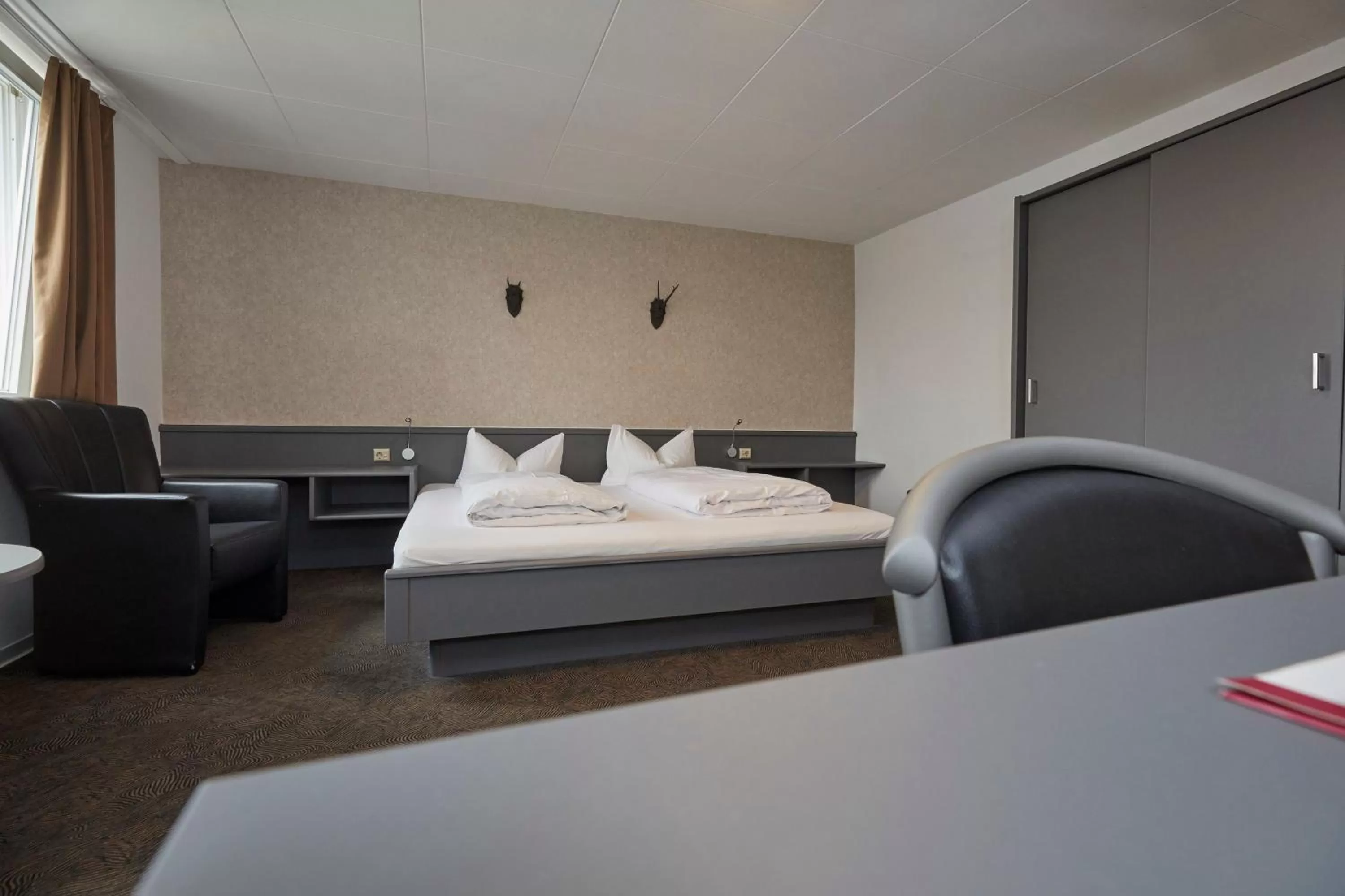 Photo of the whole room, Bed in Hotel Schlemmer Das familäre Altstadt - Hotel mit Herz