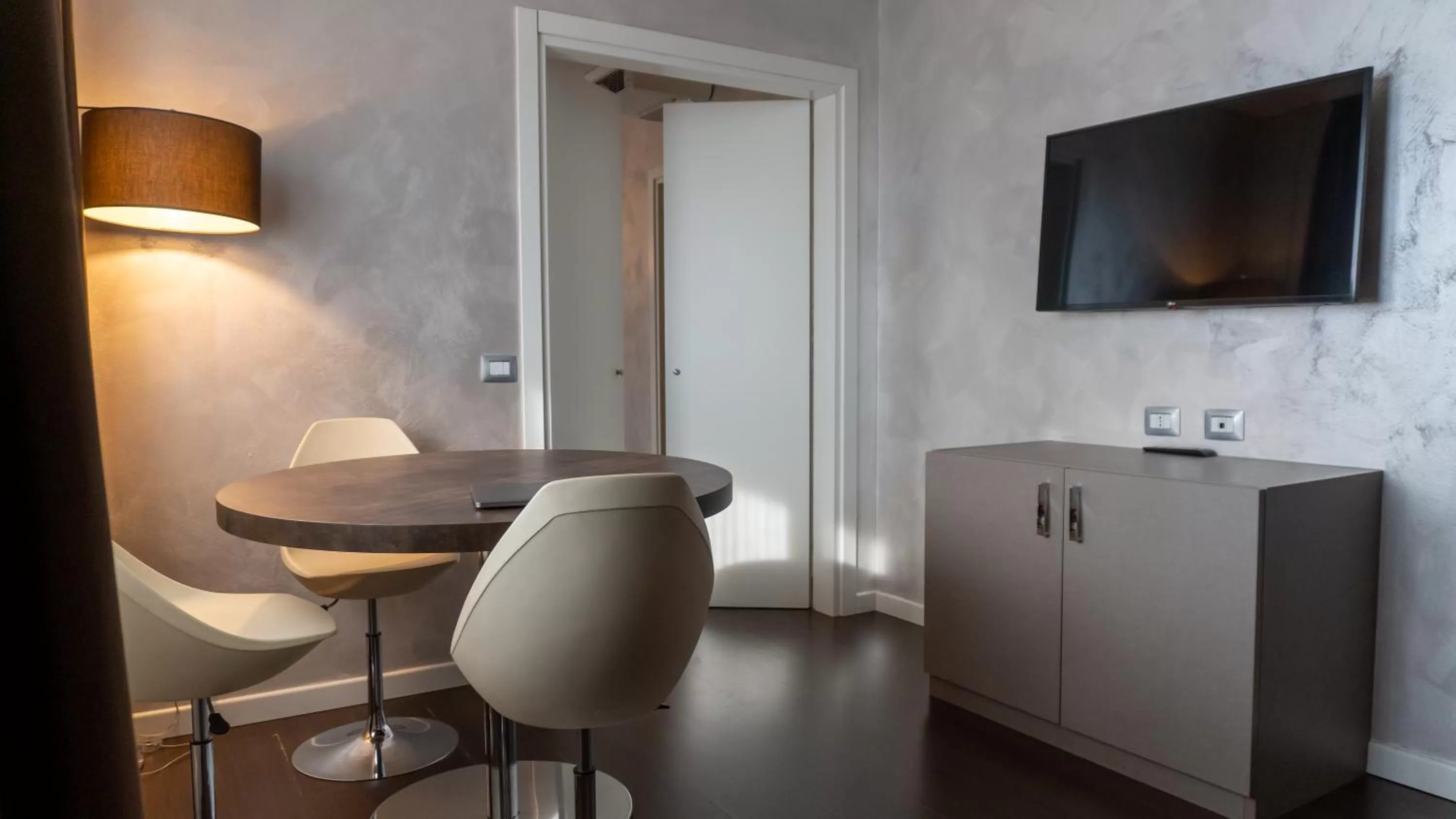 Seating area in AMEDIA Hotel