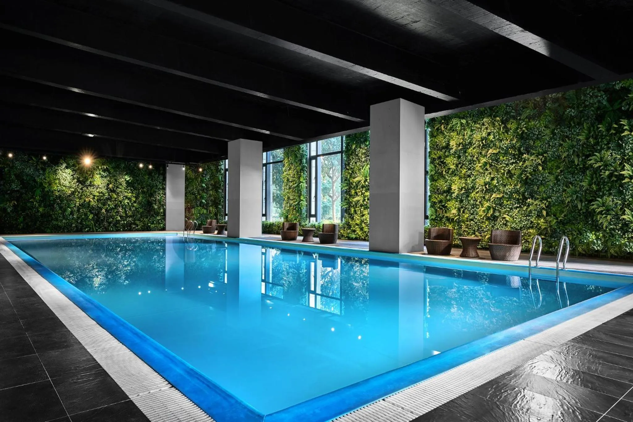 Swimming pool in Crowne Plaza Shanghai Jinshan by IHG
