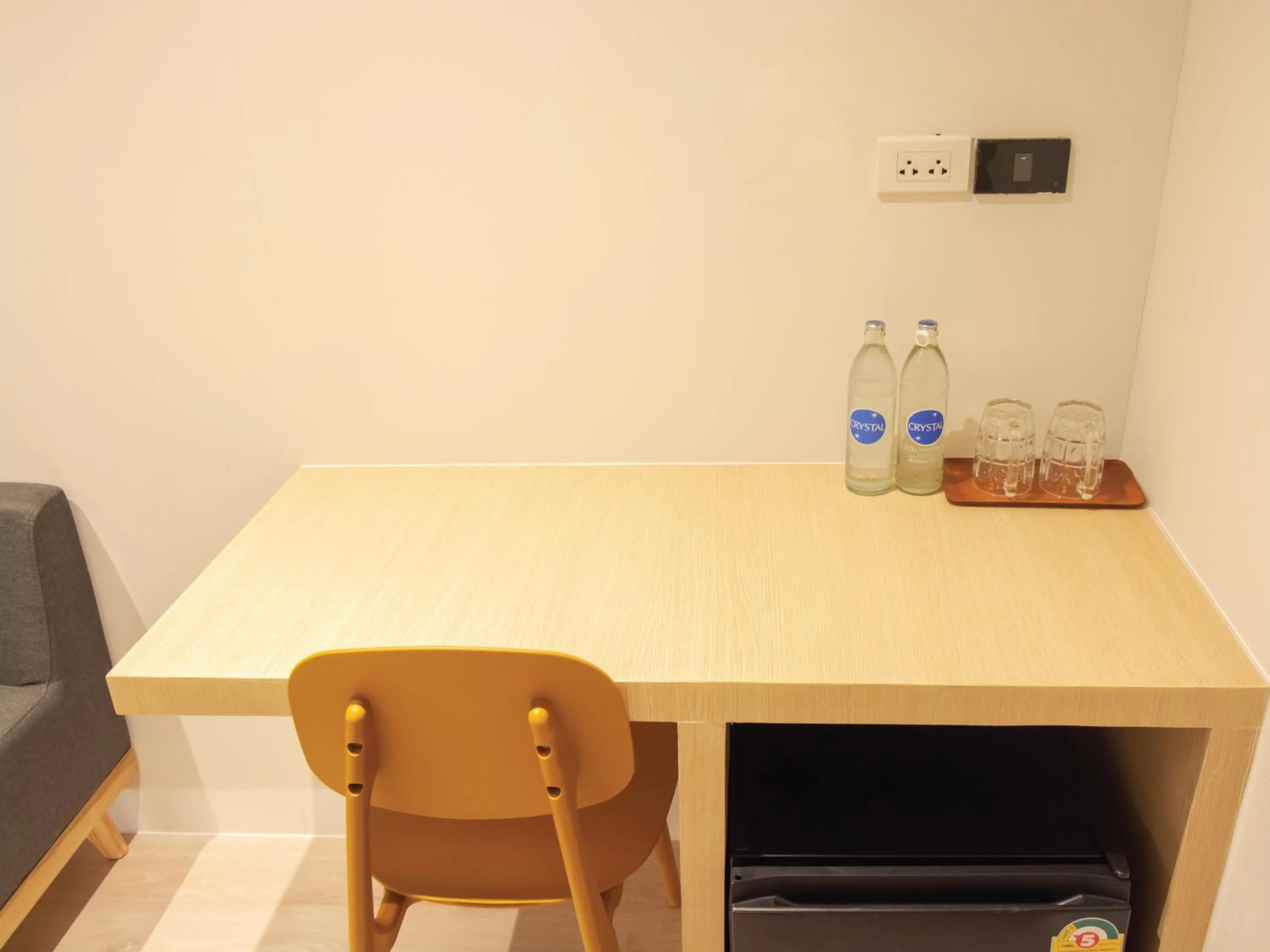 Seating area in Sleep Box Hotel Sukhumvit 22