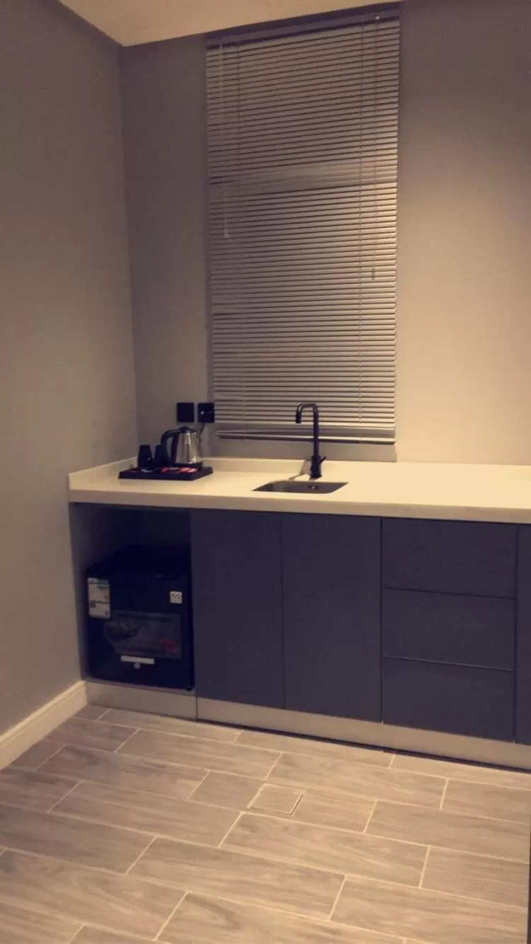 Kitchen or kitchenette in Voyage Apartments