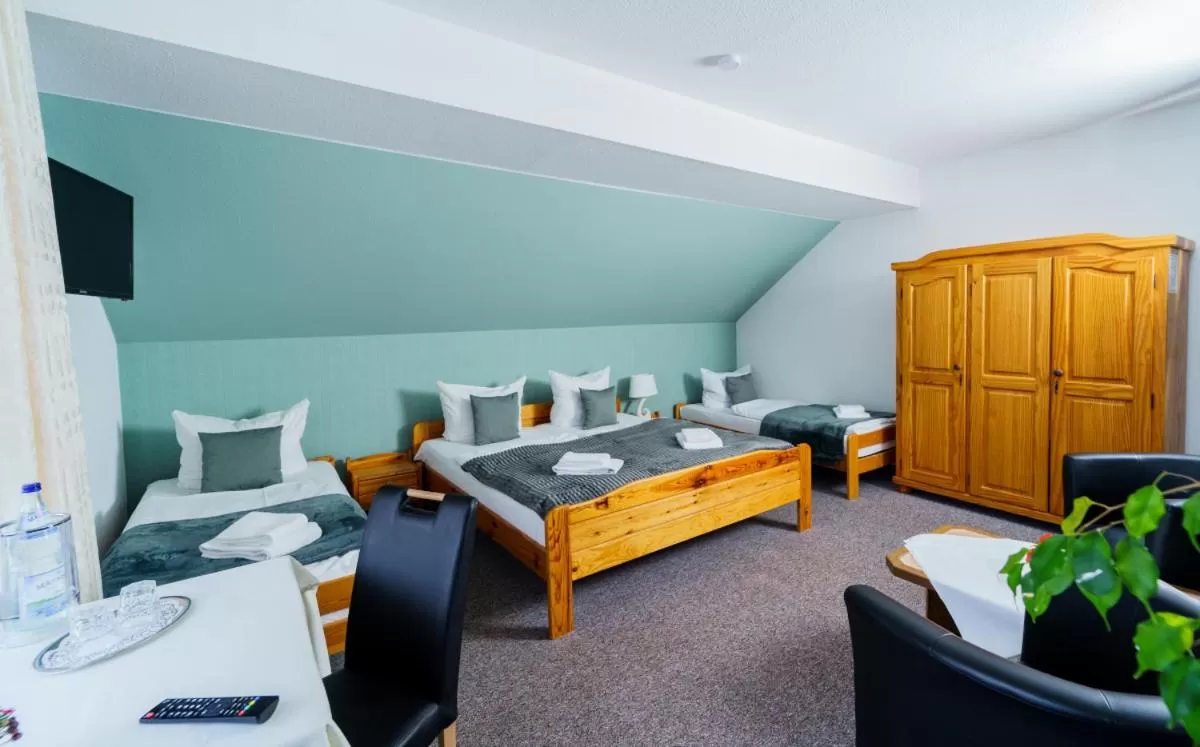 Bed in Bestwaner Hotel