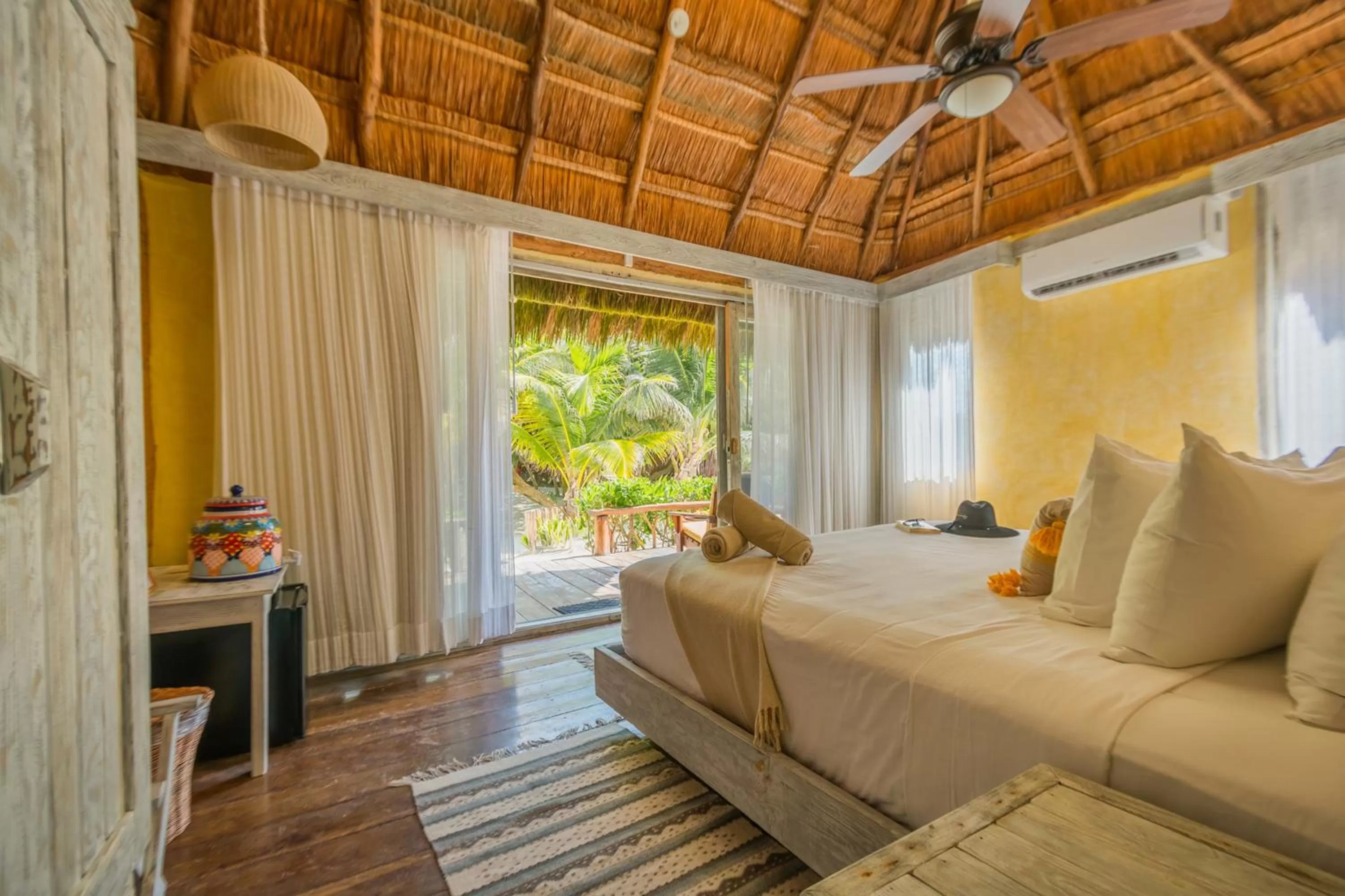 Bedroom, Bed in Villa Pescadores Tulum-Beachfront hotel by Ahau Collection