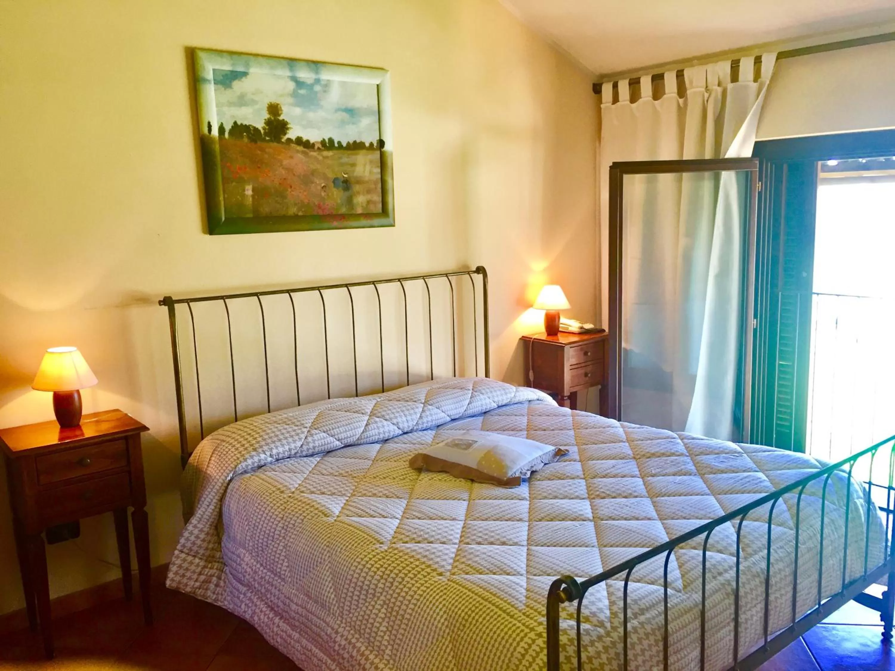 Bed in Albergo Cosmera