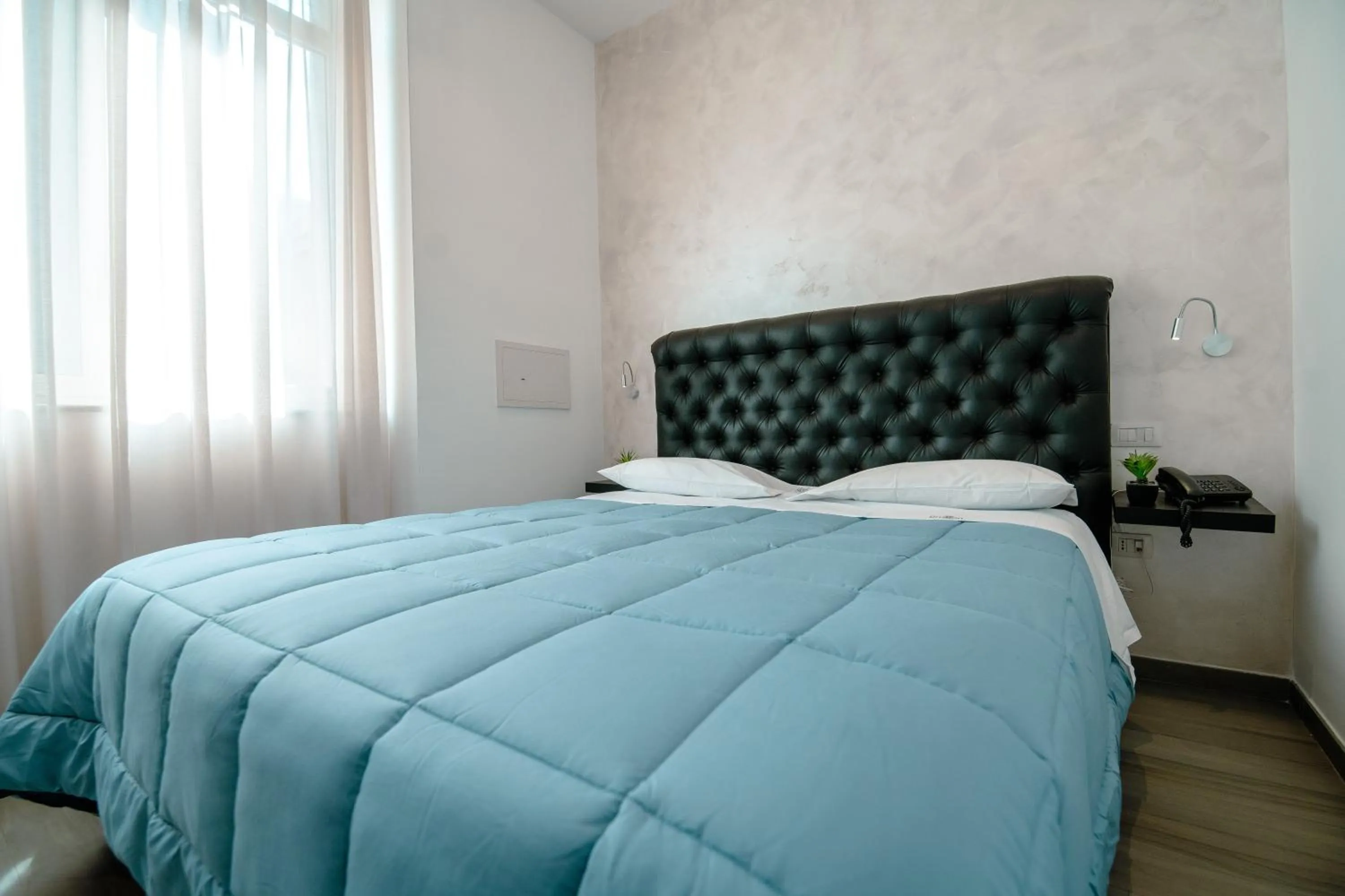 Photo of the whole room, Bed in Hotel Bruman Salerno