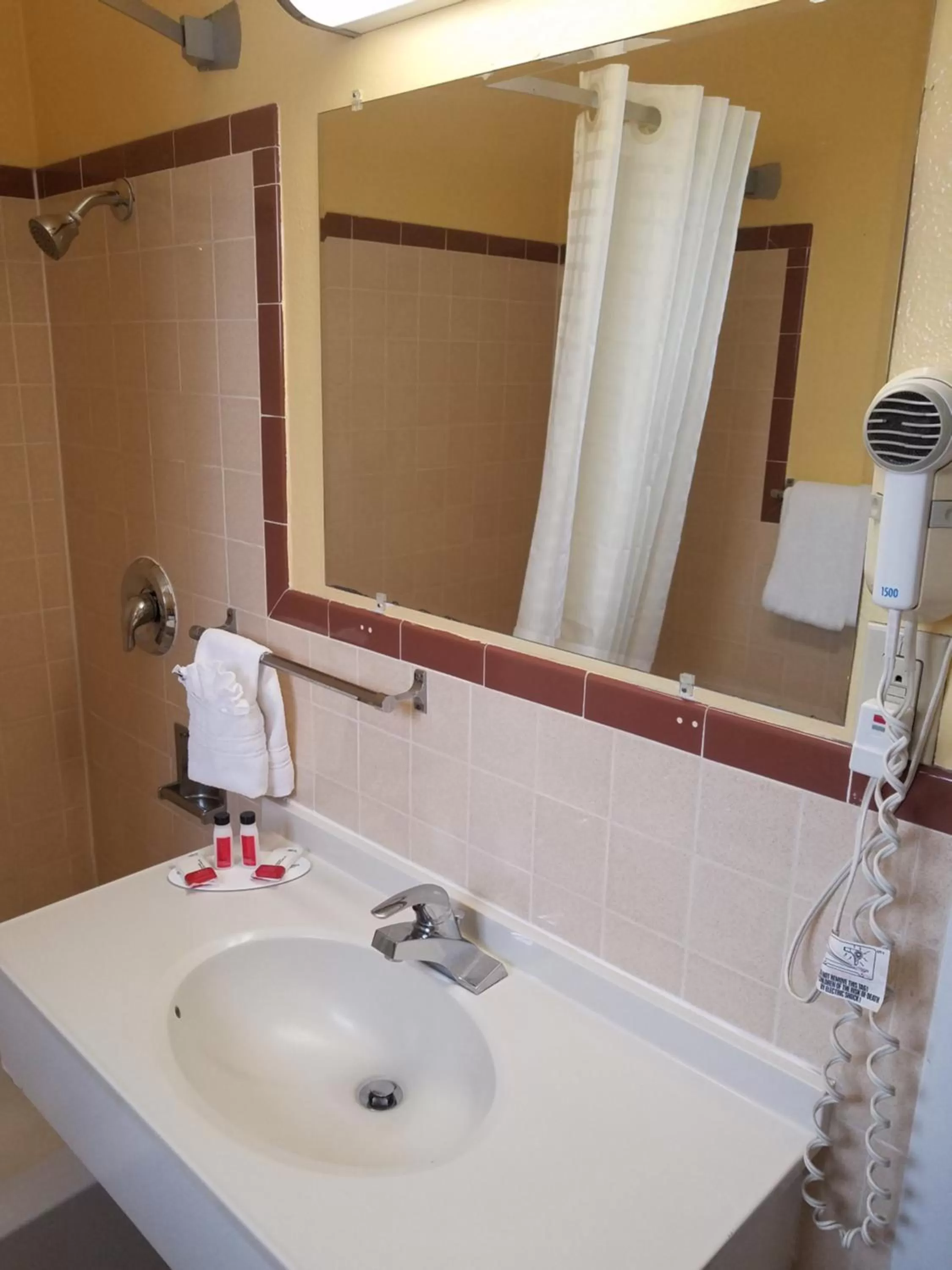 Bathroom in Travelodge by Wyndham Wenatchee