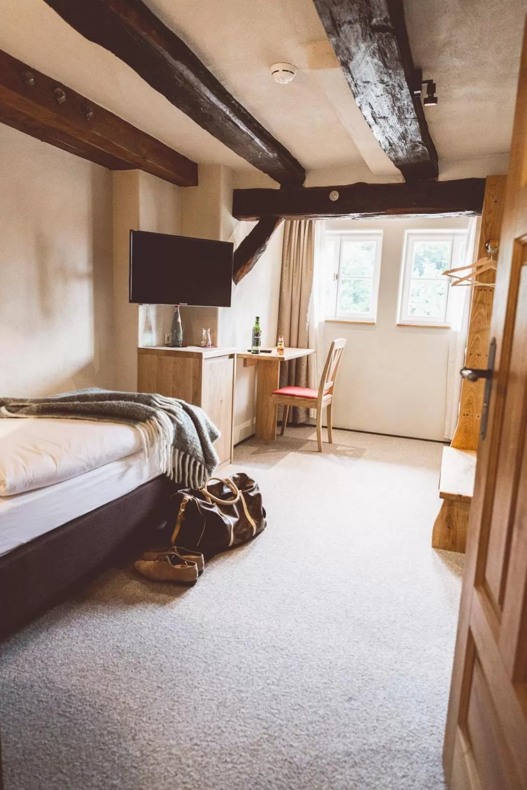 Bed, TV/Entertainment Center in Landhotel Lammershof