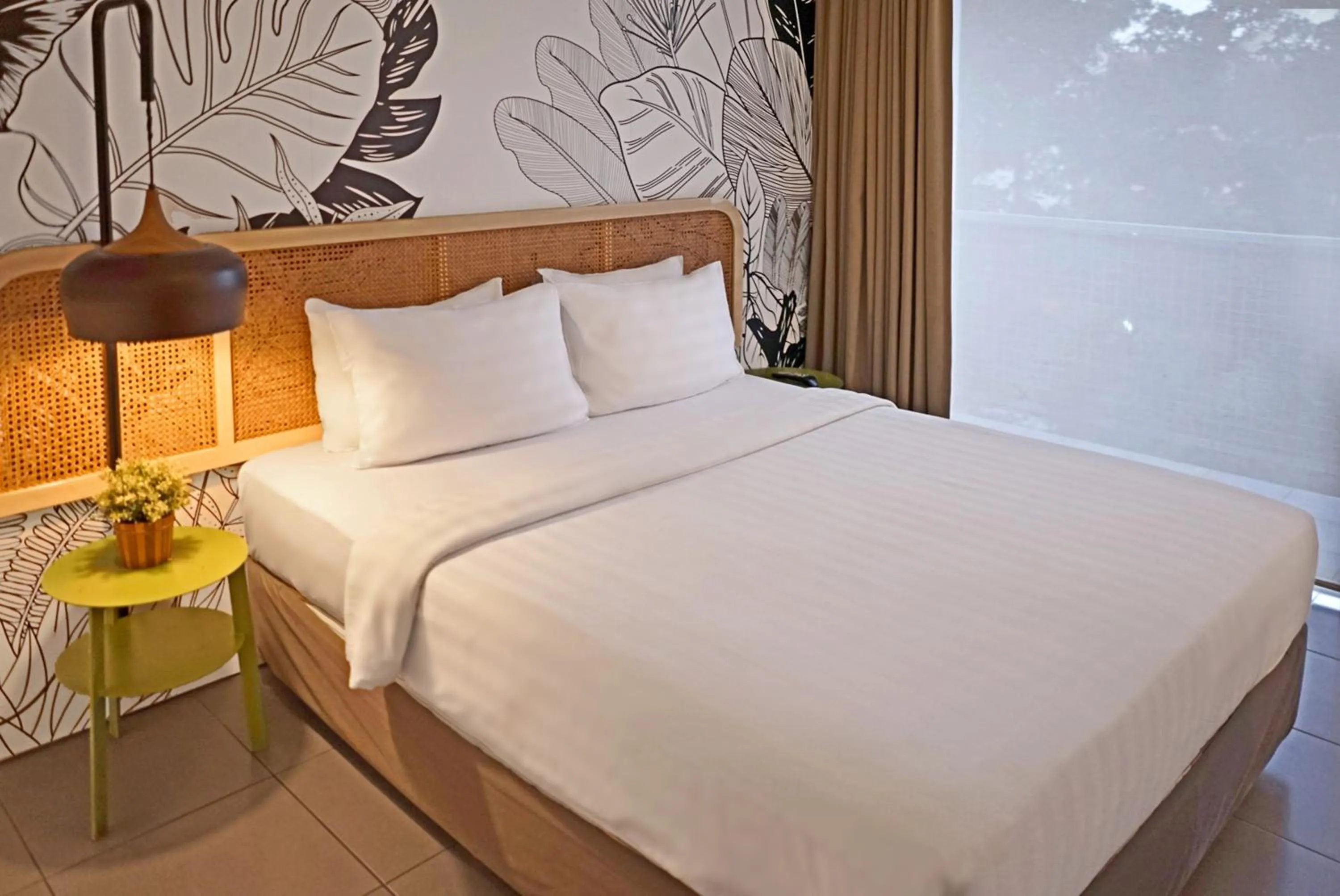 Bed in Malaka Hotel Bandung