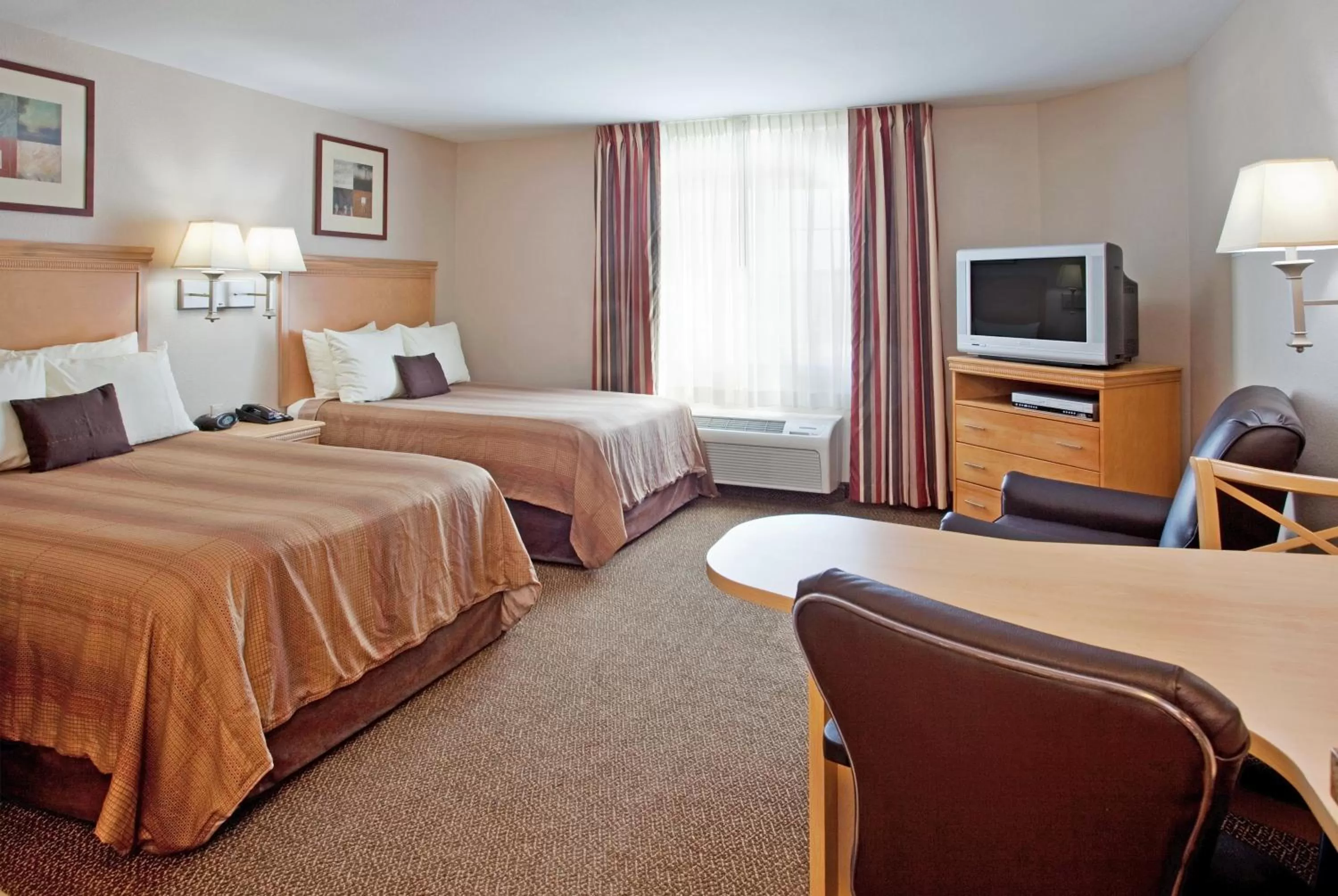 Photo of the whole room, Bed in Candlewood Suites Junction City - Ft. Riley by IHG