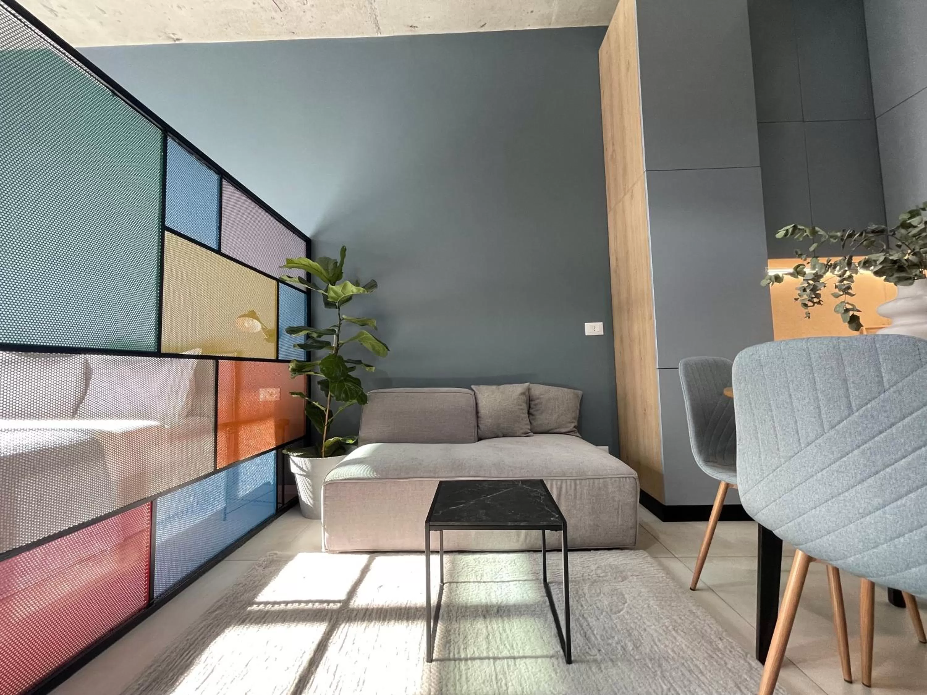 Bed, Seating Area in Ambassador Skyline Apartments