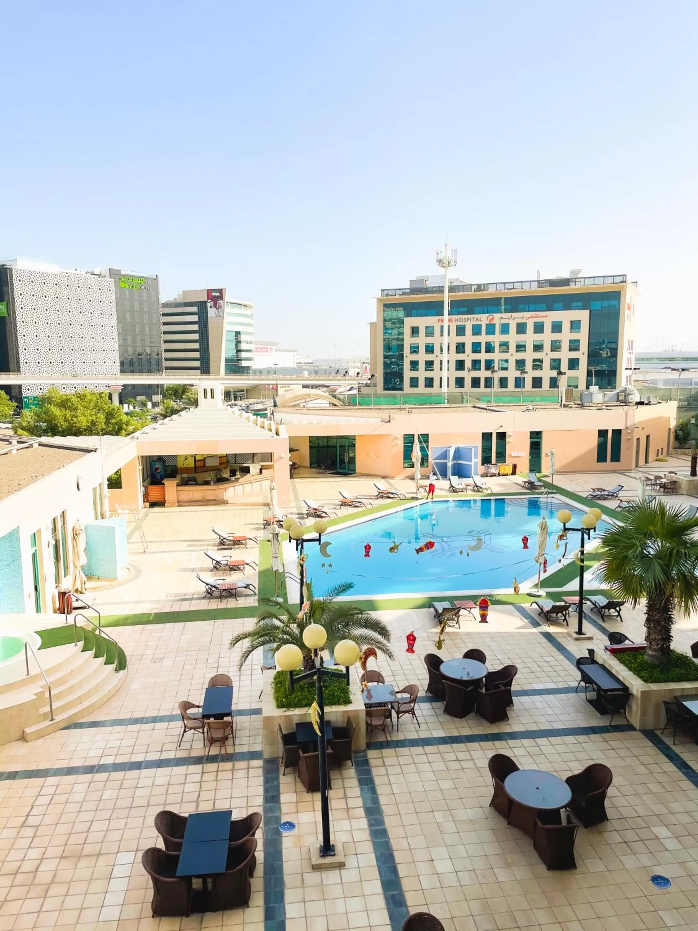 Swimming pool in Mövenpick Grand Al Bustan