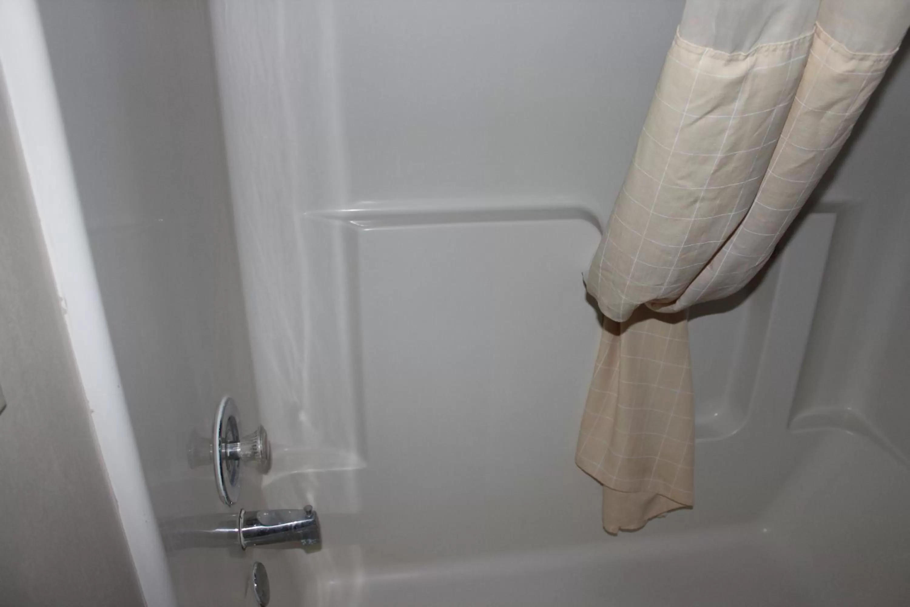 Bathroom in Coratel Inn and Suites Maple Grove